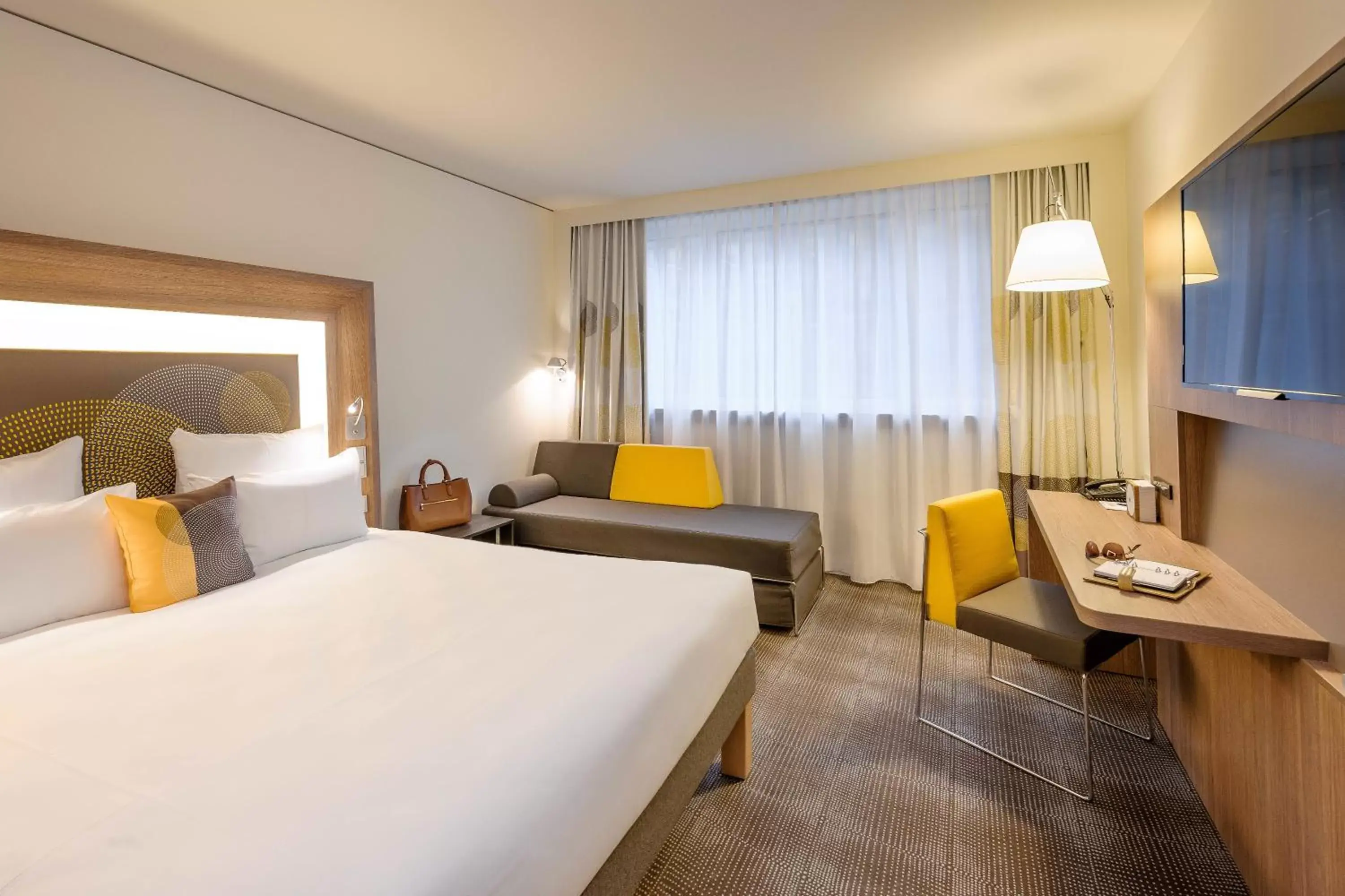 Photo of the whole room in Novotel München City Arnulfpark