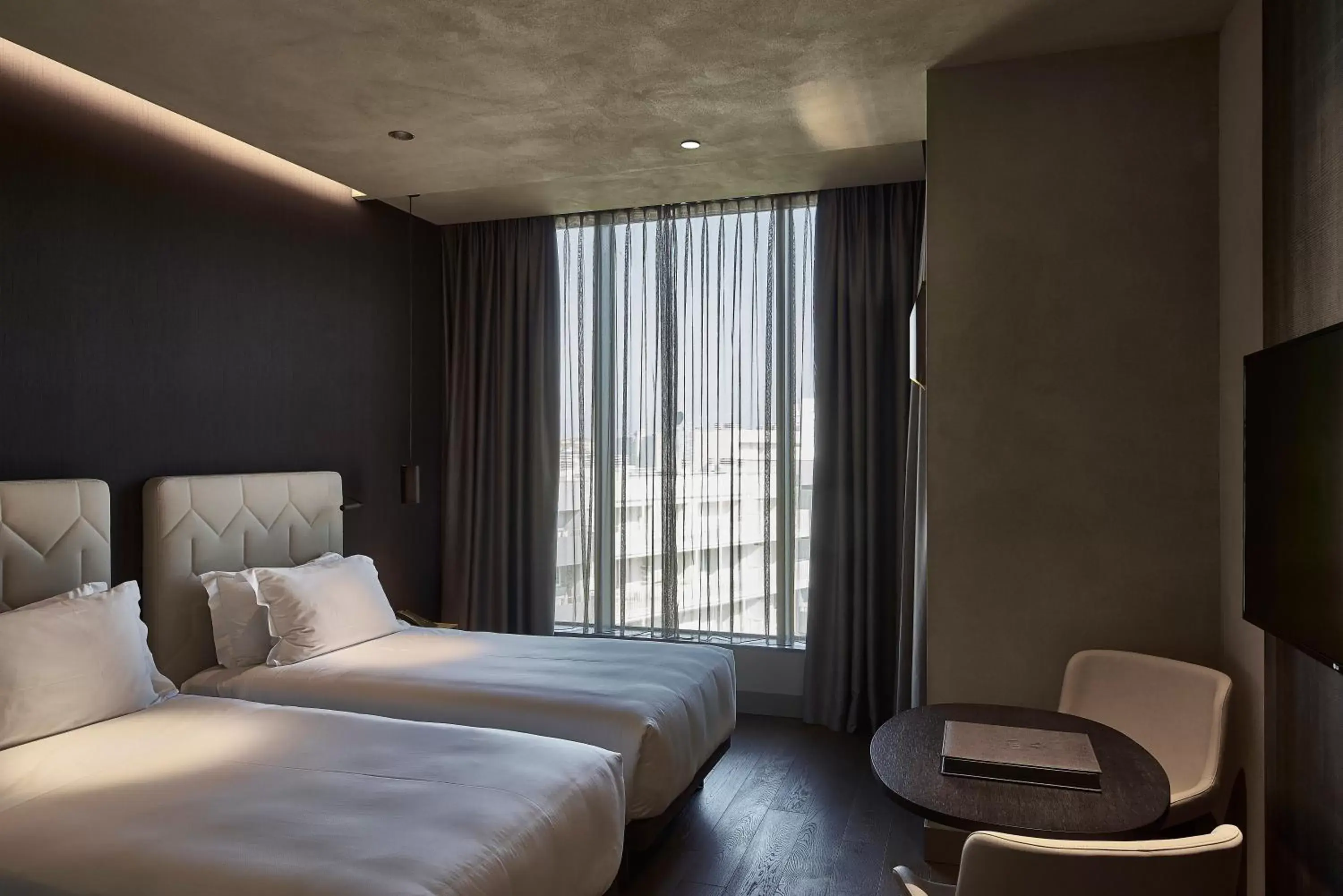 Bed in Hotel VIU Milan