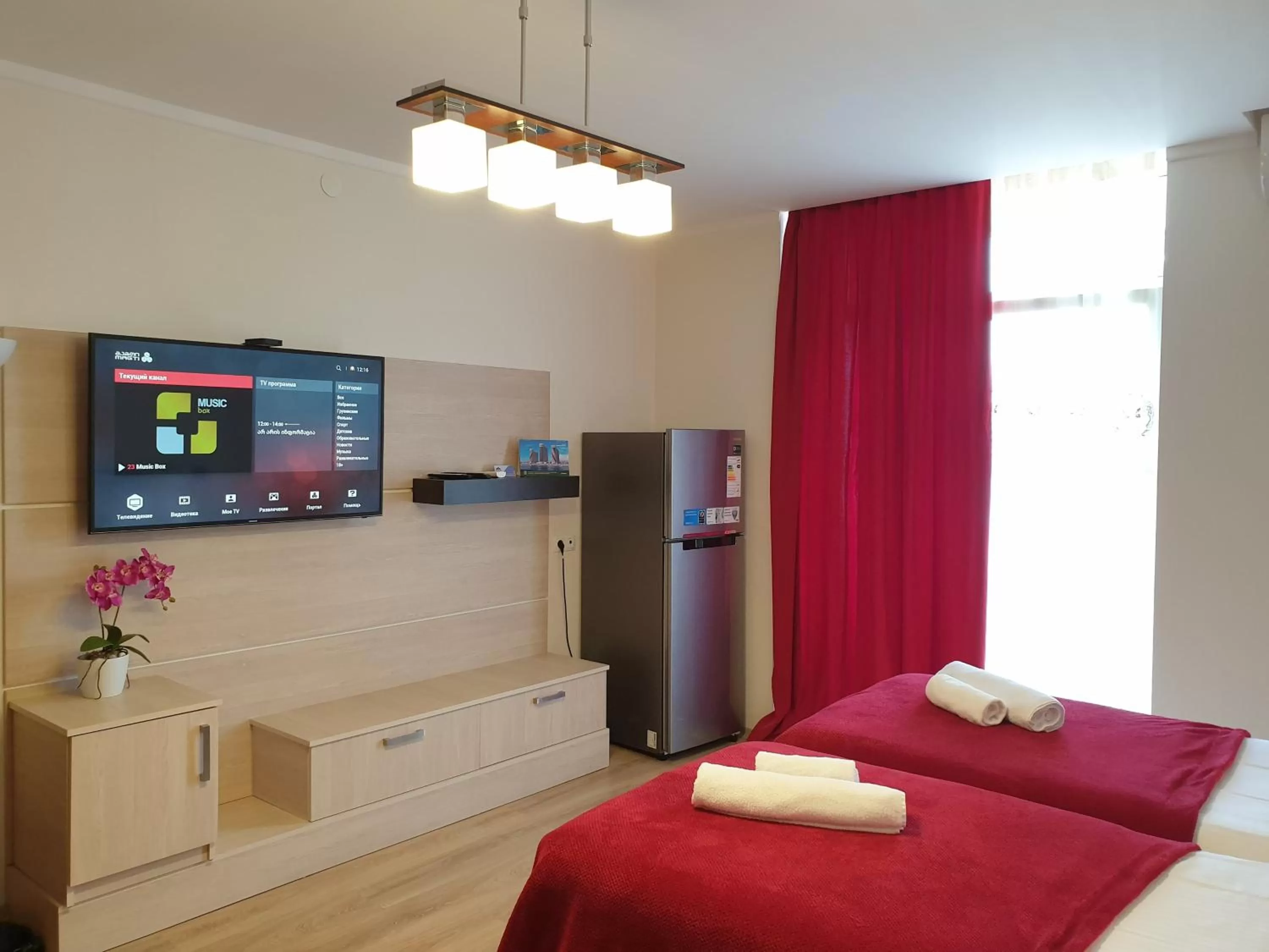 Bed, TV/Entertainment Center in Holiday Lux Sea Towers Batumi