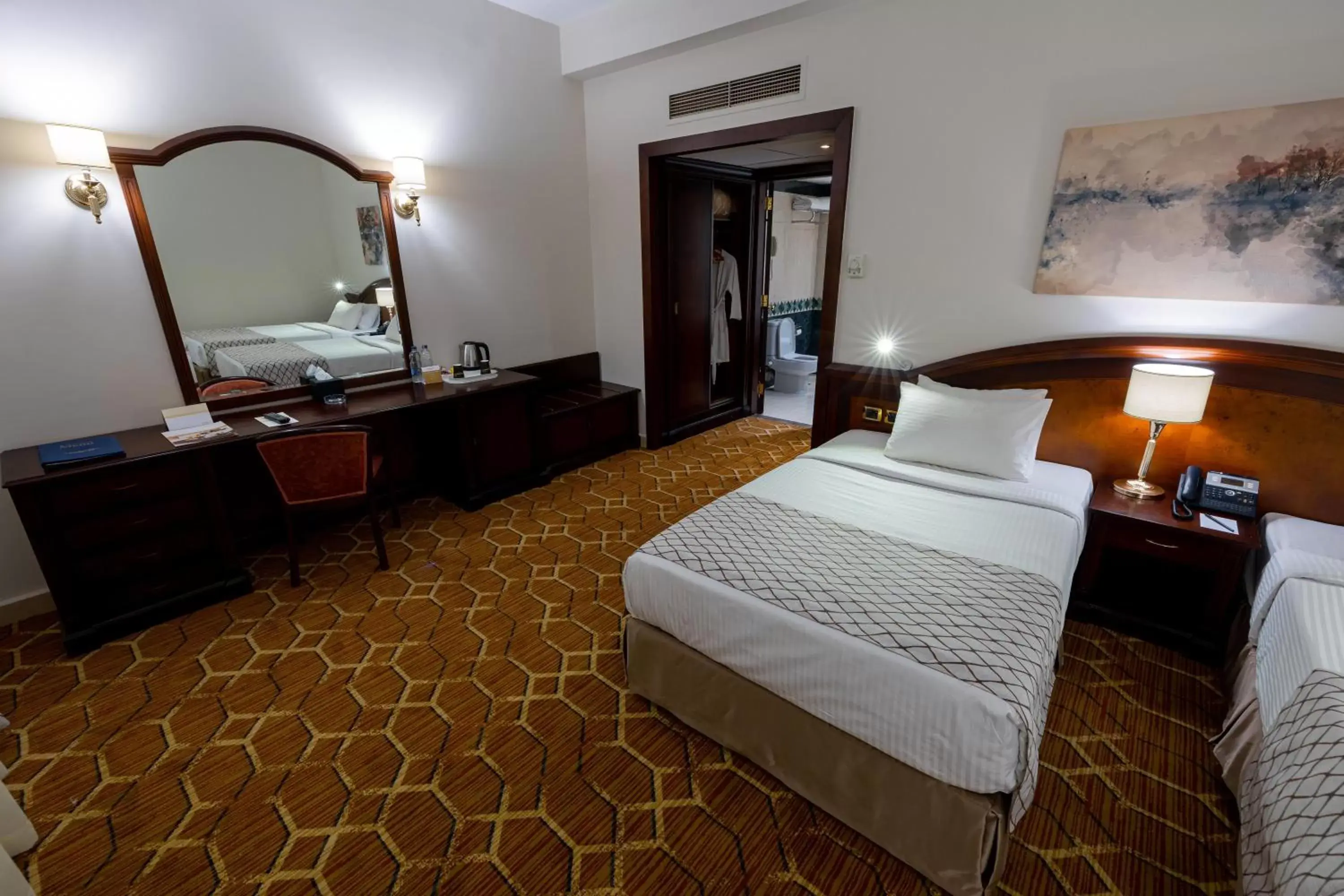 Photo of the whole room, Bed in Triumph Plaza Hotel