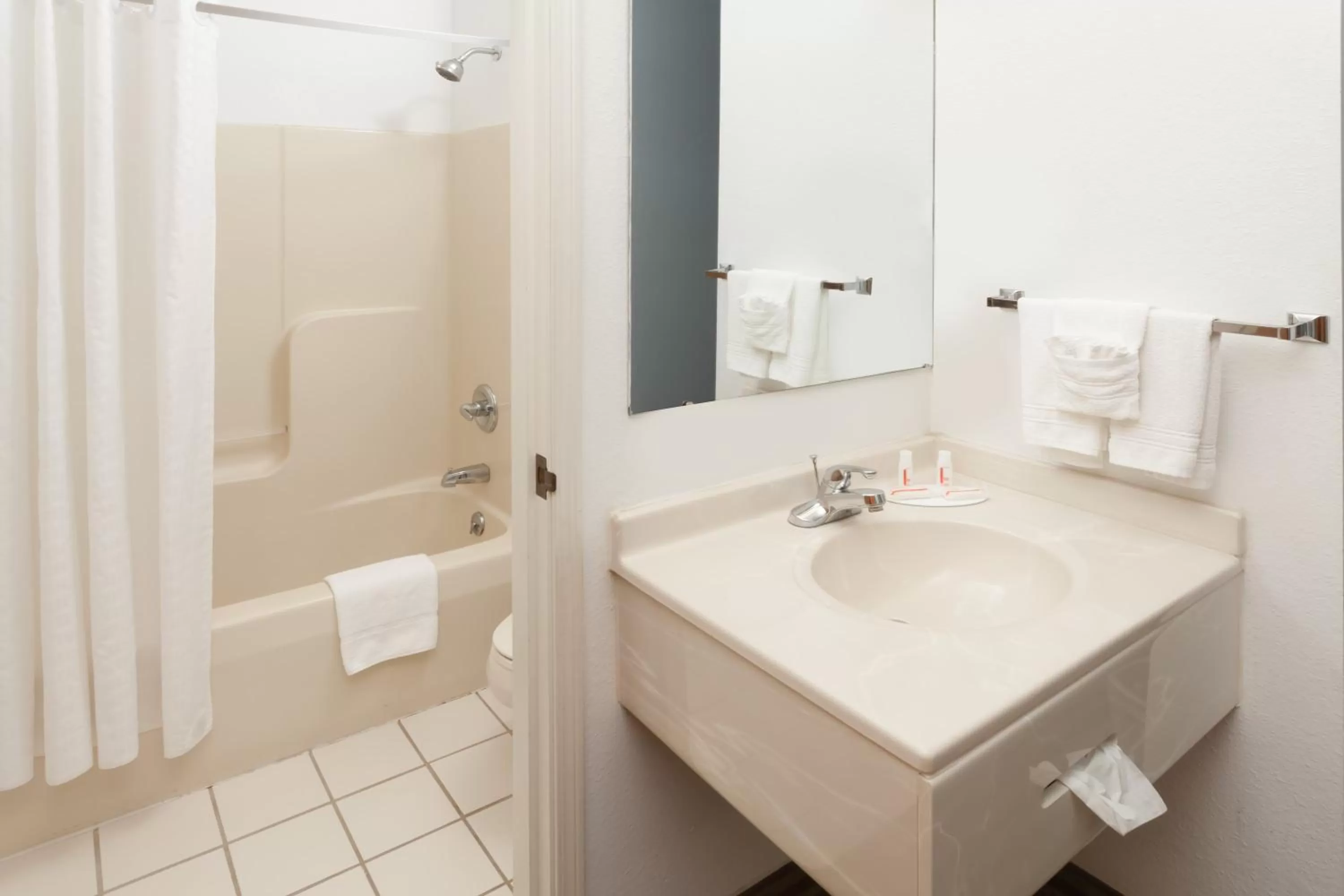 Bathroom in Super 8 by Wyndham Huntington