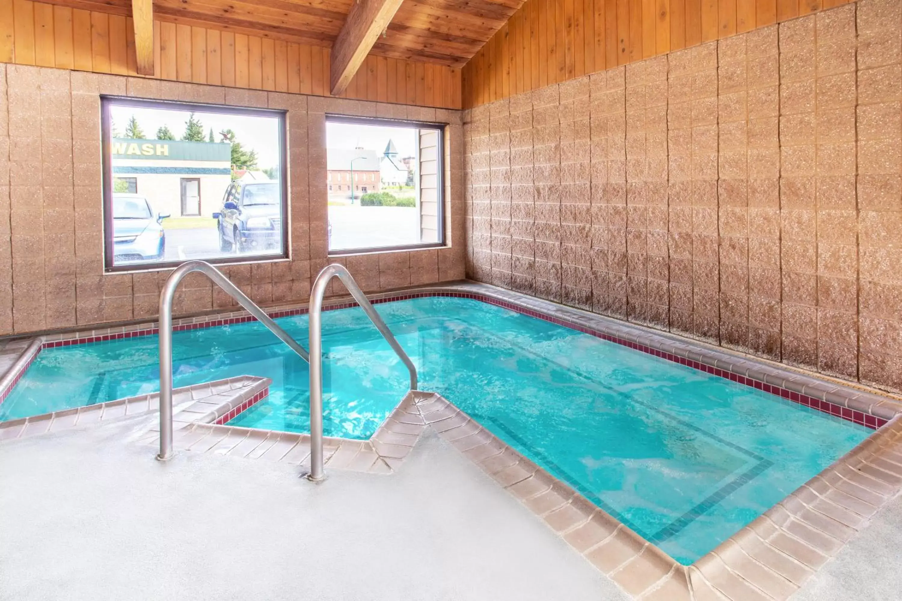 Hot Tub, Swimming Pool in AmericInn by Wyndham Calumet