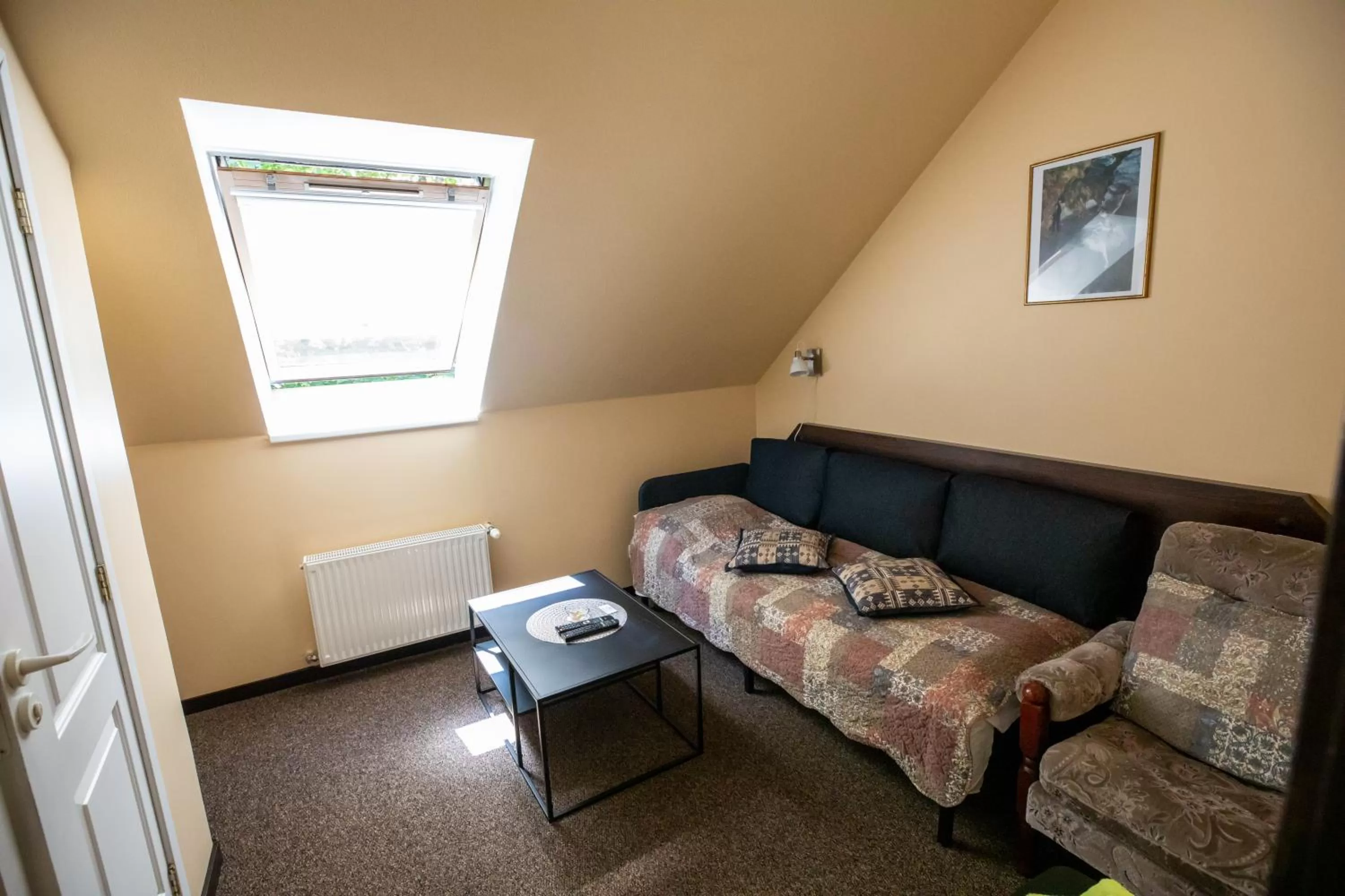 Seating area in City Center Kaķis B&B