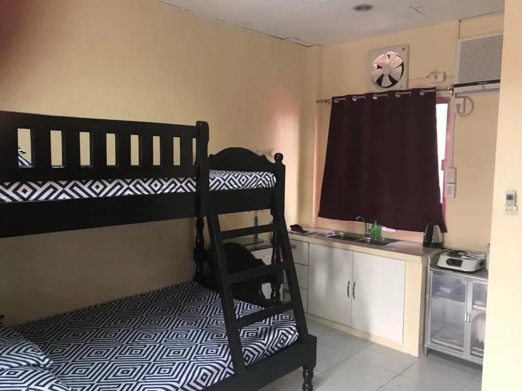 Bed in RV3 TRANSIENT HOUSE