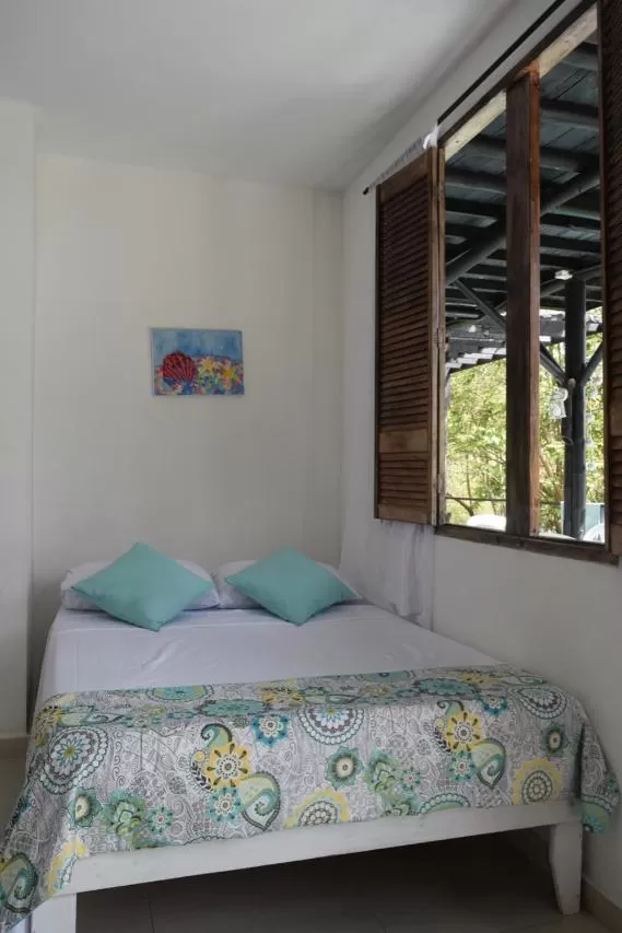 Bed in Massalli Sanctuary Lodge