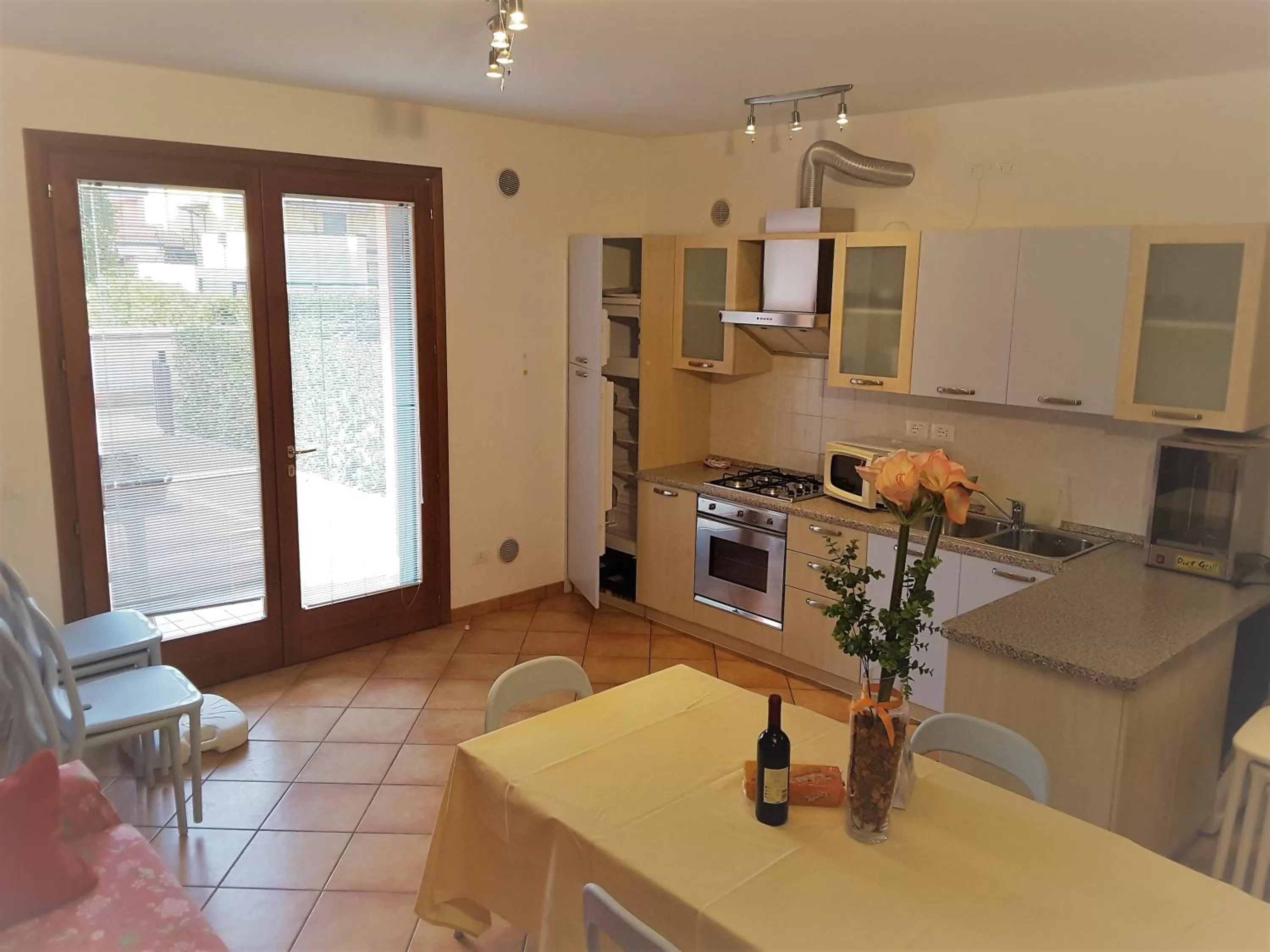 Kitchen/Kitchenette in Villaggio dei Fiori Apart- Hotel 3 Stars - Family Resort