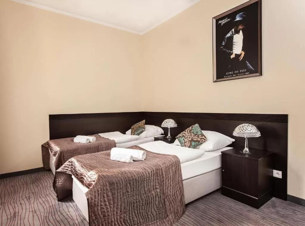 Bed in Hotel Willa Adriana