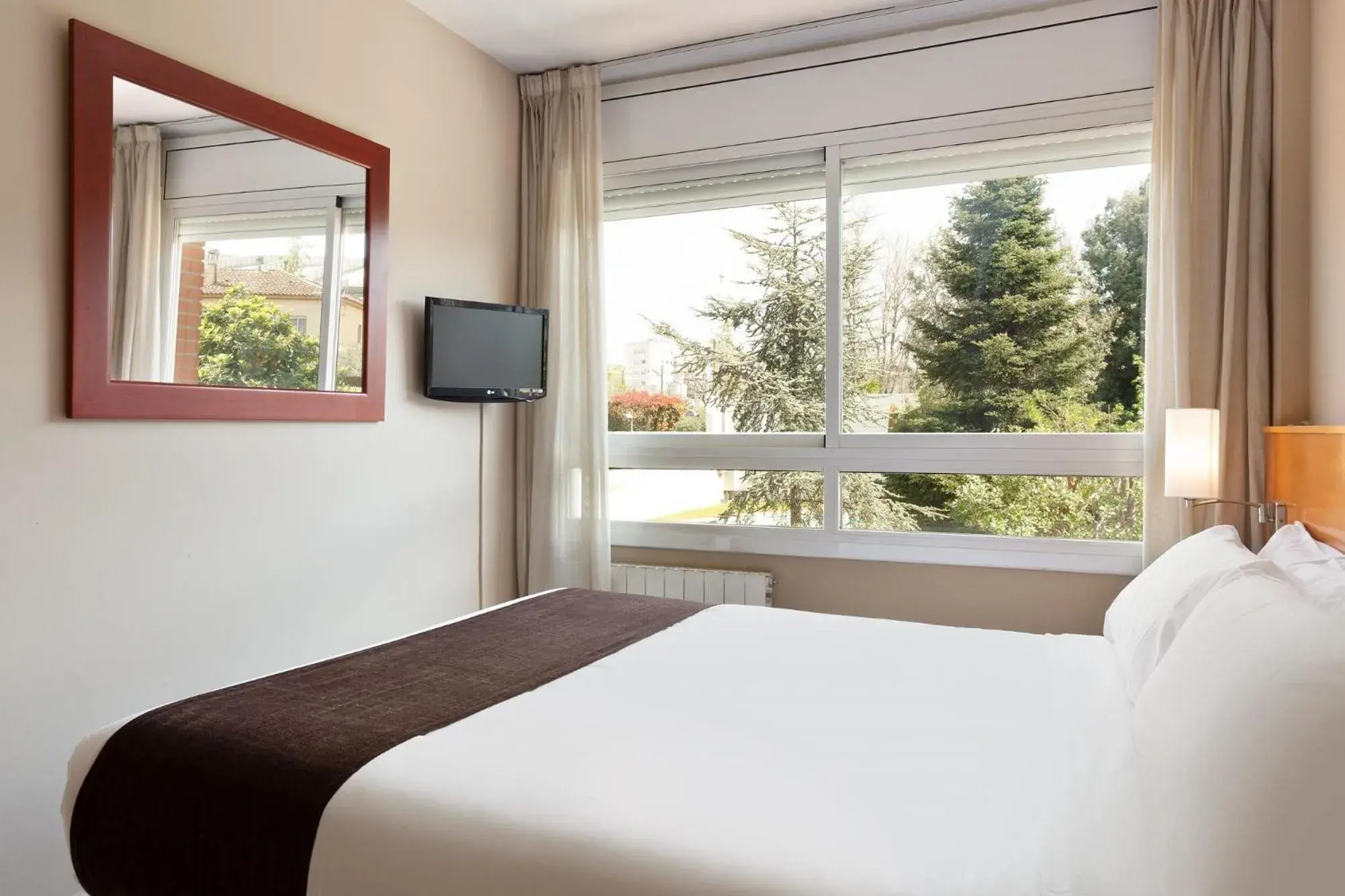 Bed in PARK SEDO Aparthotel Bed in PARK SEDO Aparthotel