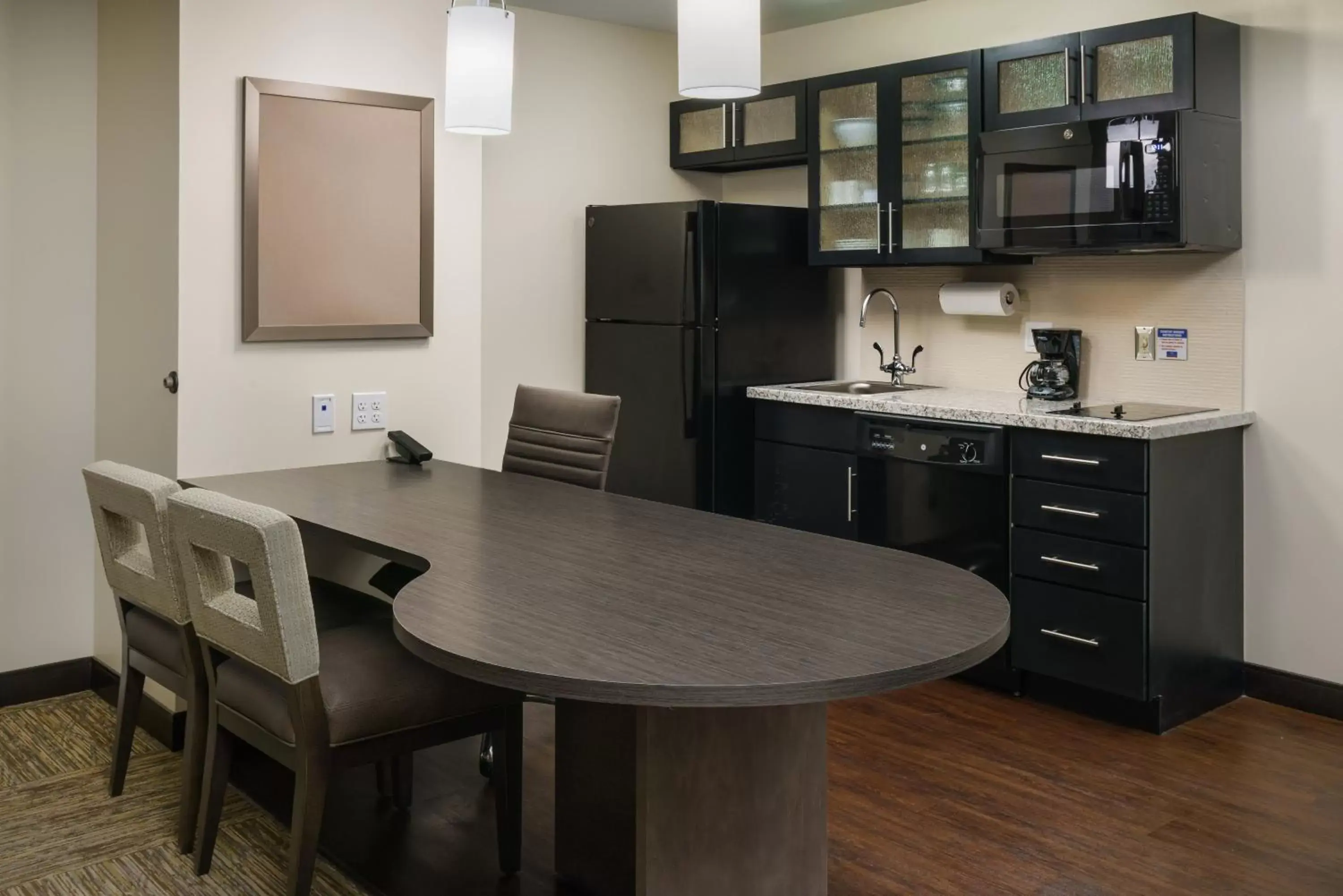 Photo of the whole room, Kitchen/Kitchenette in Candlewood Suites - Orlando - Lake Buena Vista, an IHG Hotel