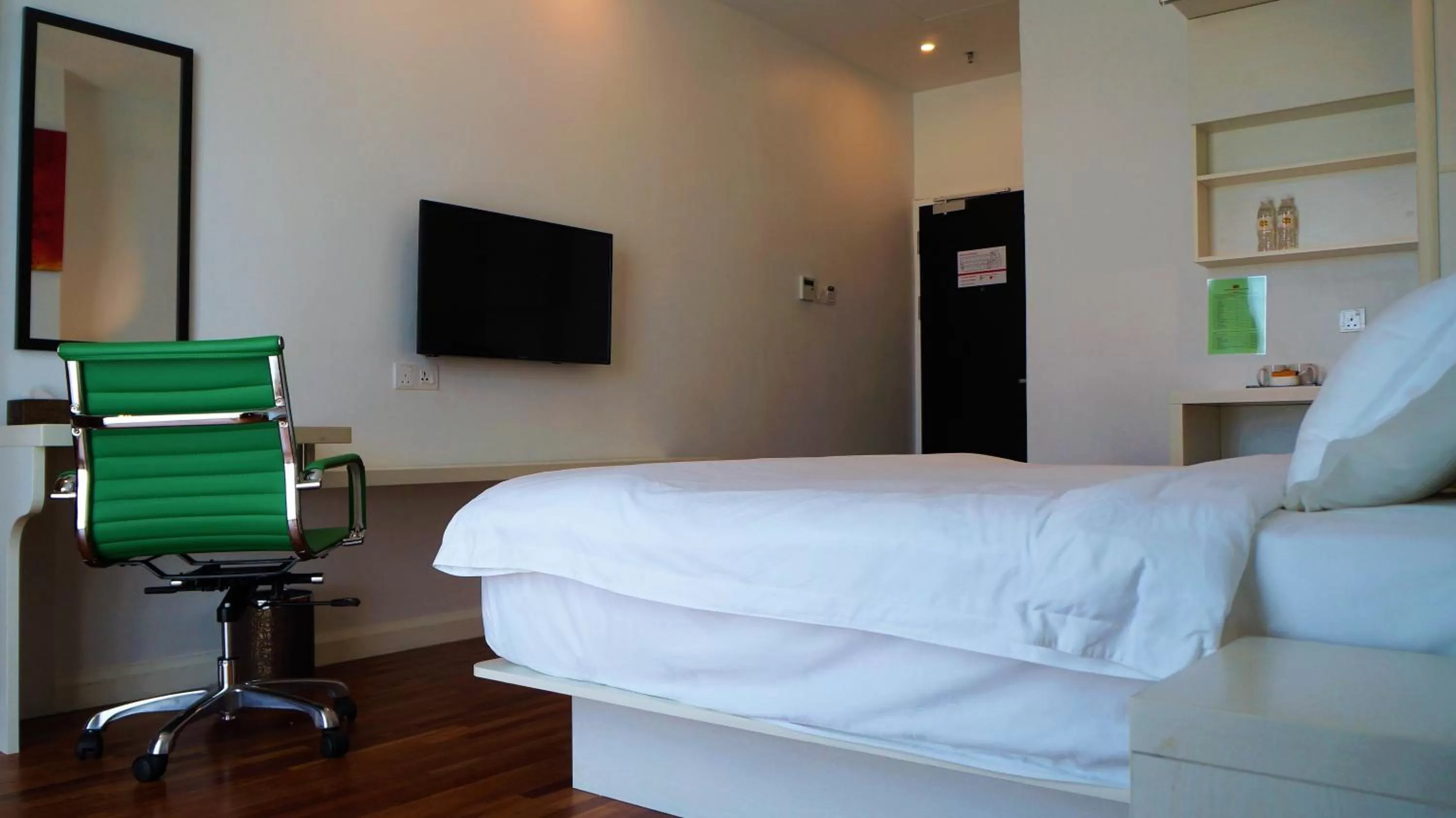 Bed in Pine Garden Hotel