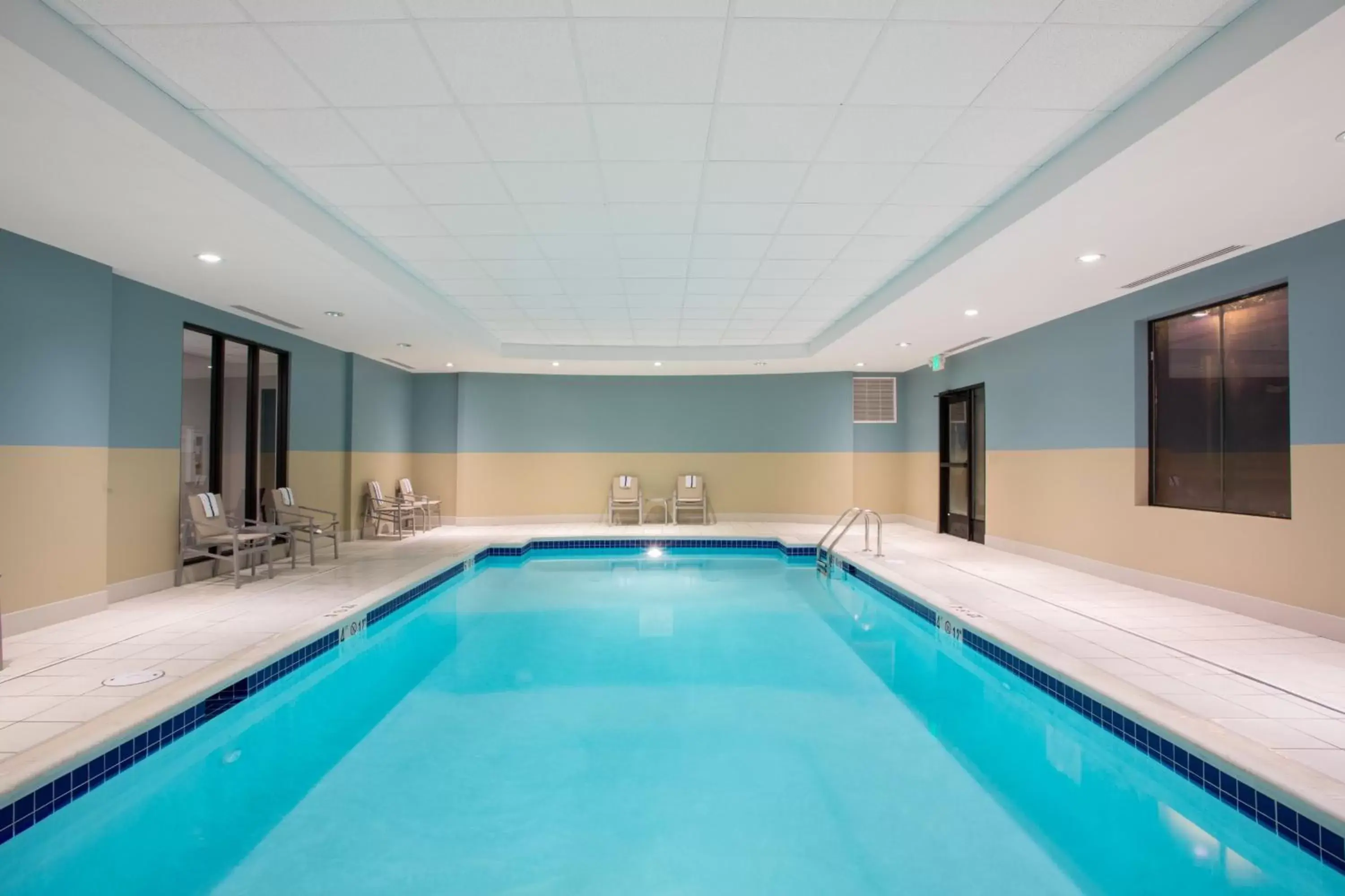 Swimming Pool in Holiday Inn Express & Suites Owings Mills-Baltimore Area, an IHG Hotel