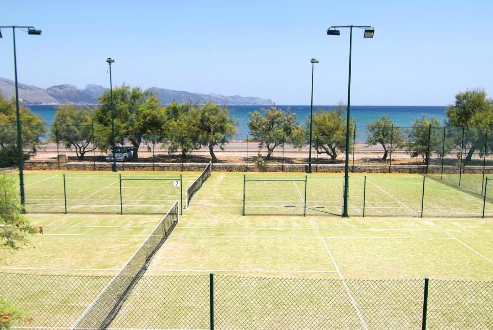 Tennis court in PortBlue Club Pollentia Resort & Spa