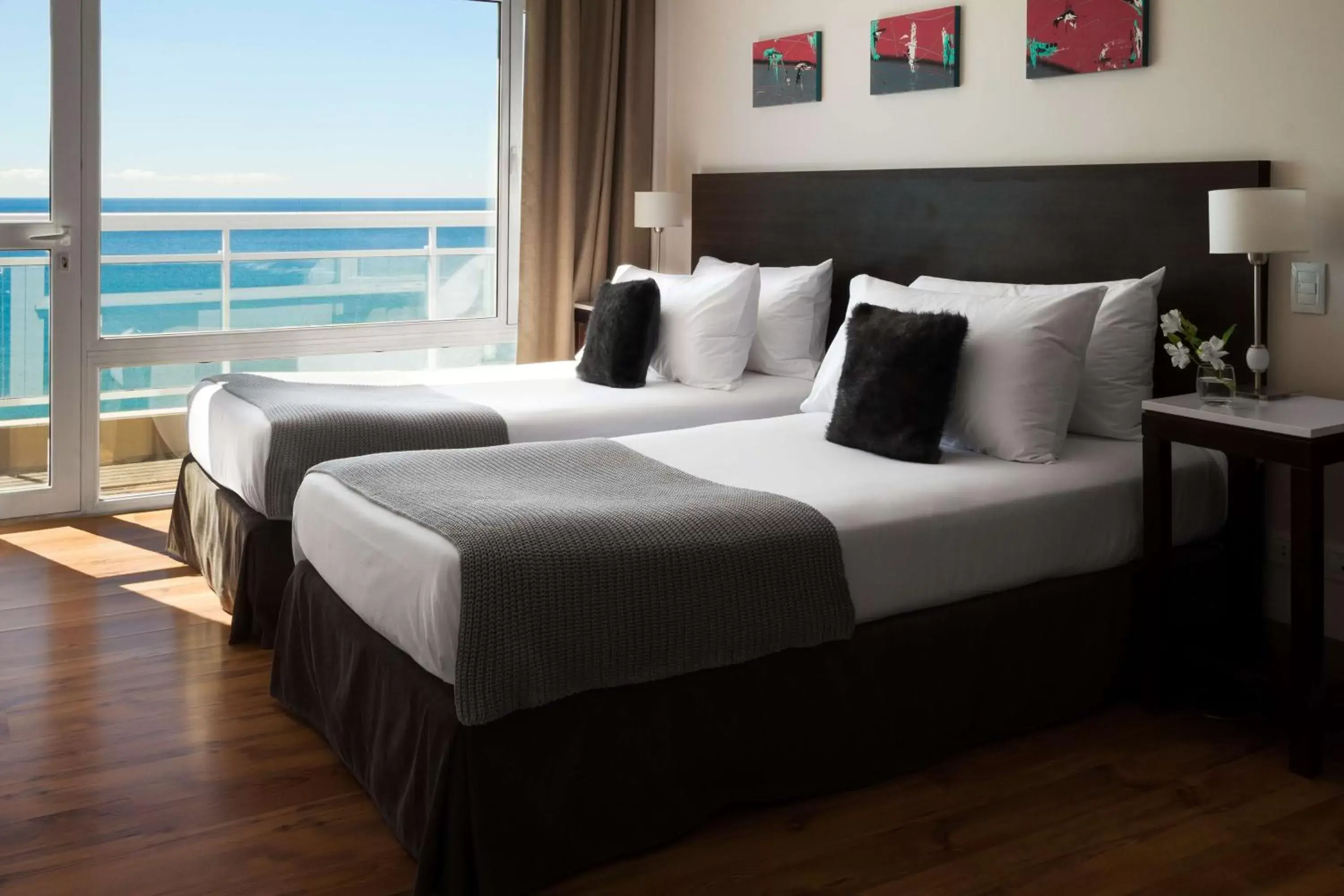 Photo of the whole room, Bed in Dazzler by Wyndham Puerto Madryn