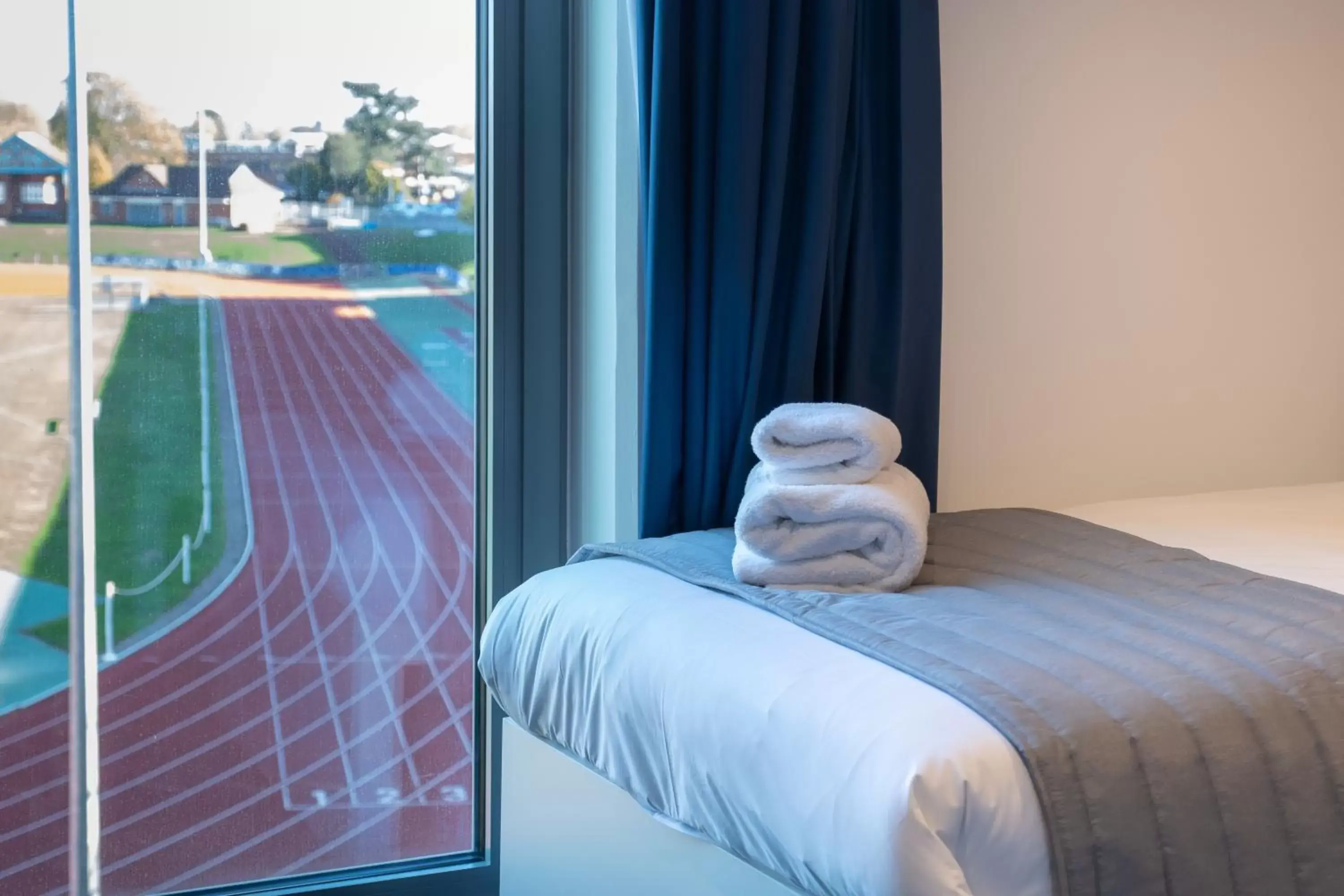 Bedroom, Bed in Elite Athlete Centre and Hotel