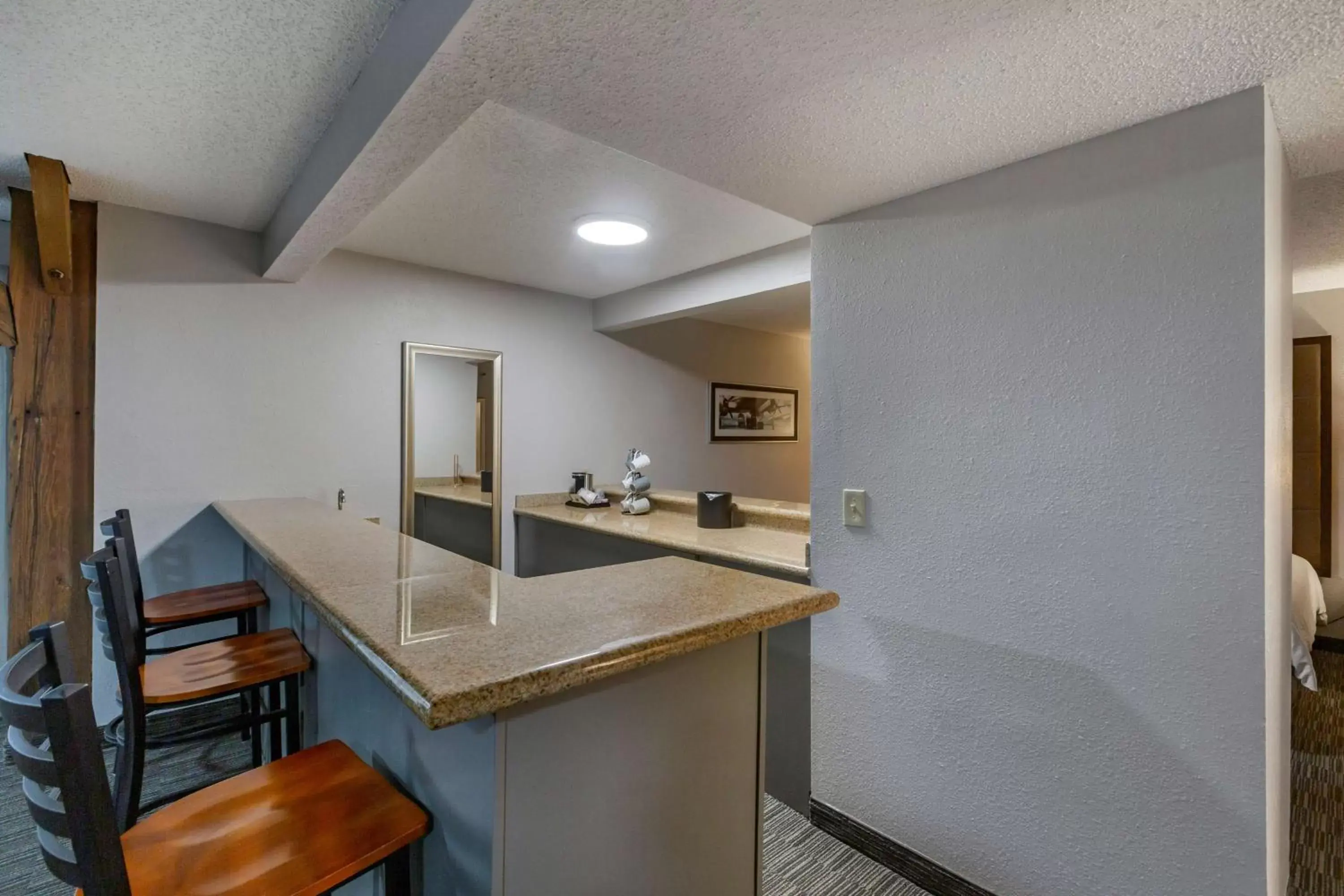 One-Bedroom King Suite with Sofa Bed and Wet Bar in Best Western Plus Como Park Hotel One-Bedroom King Suite with Sofa Bed and Wet Bar in Best Western Plus Como Park Hotel