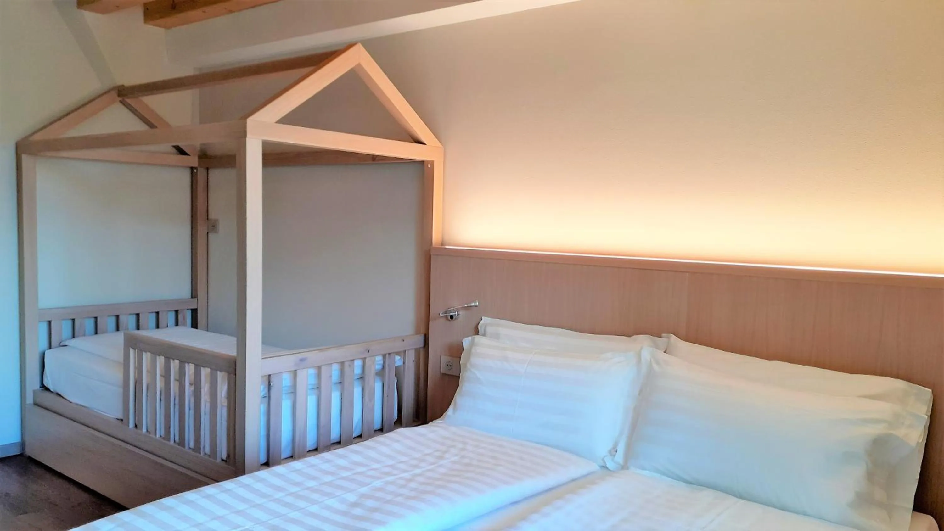 Bed in Livì Family Hotel