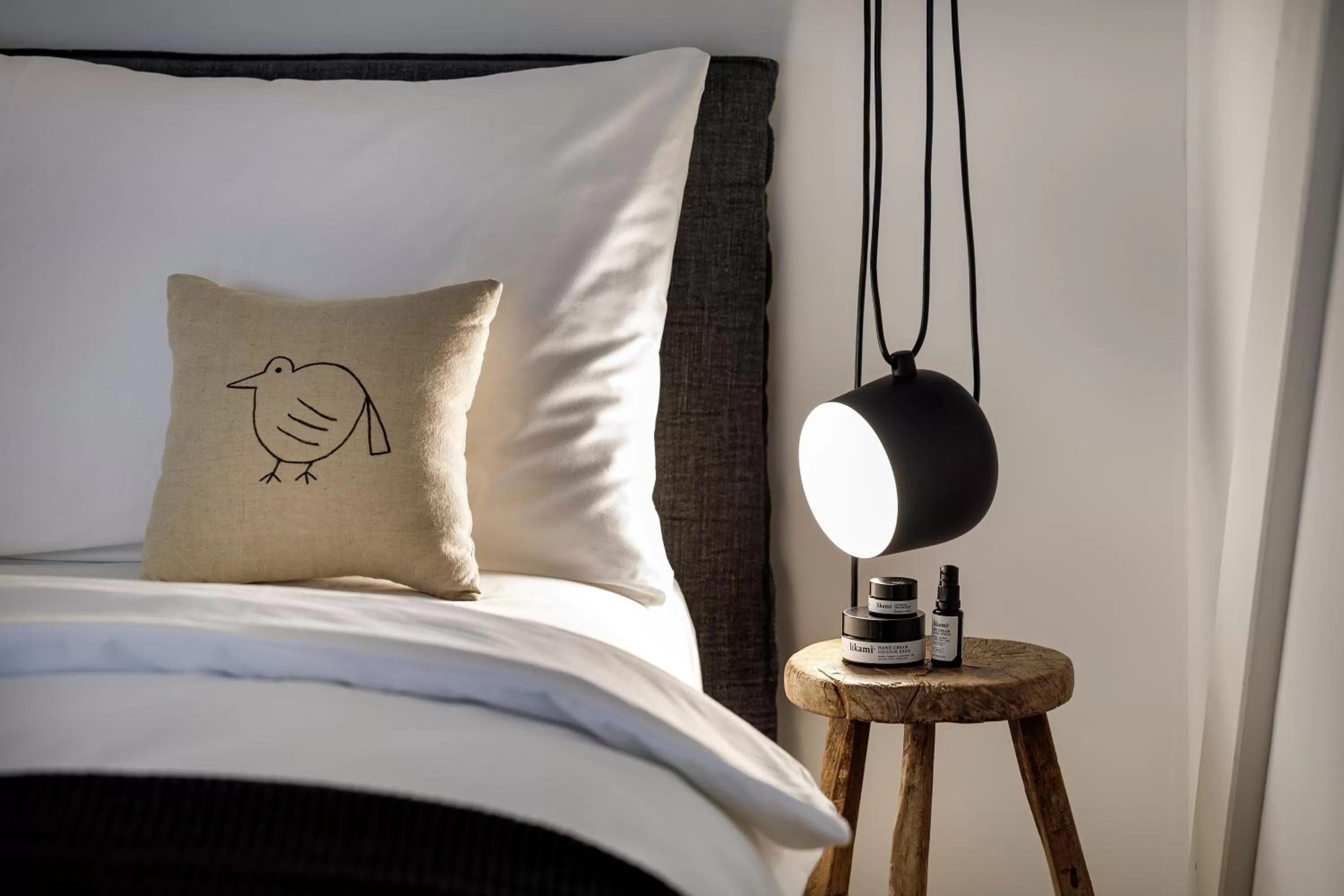 Bed in La Colombe Boutique Hotel