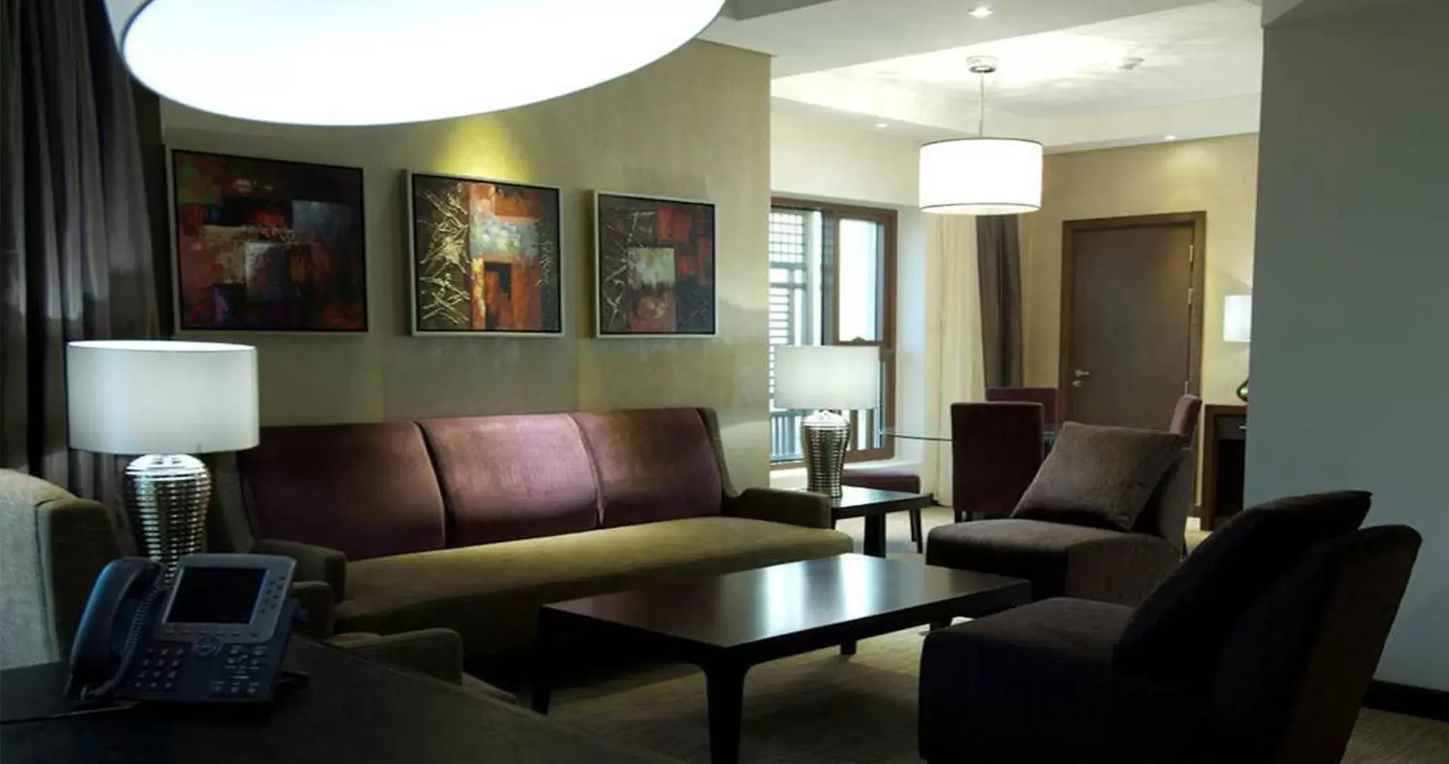 Living room in Crowne Plaza Madinah by IHG Living room in Crowne Plaza Madinah by IHG