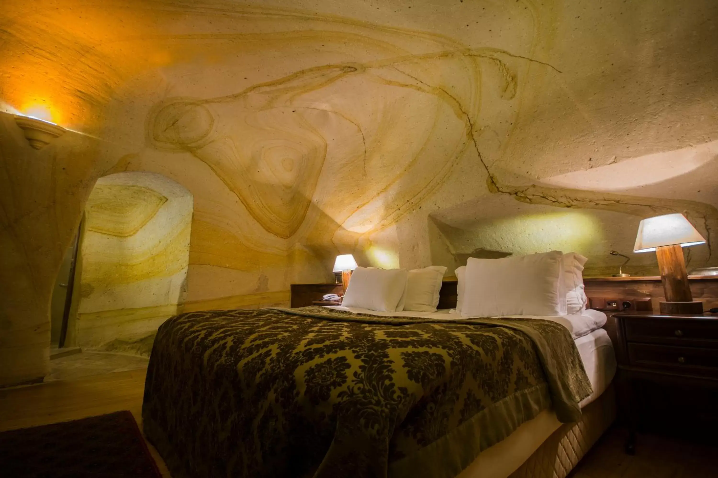 Bed in Fresco Cave Suites Cappadocia