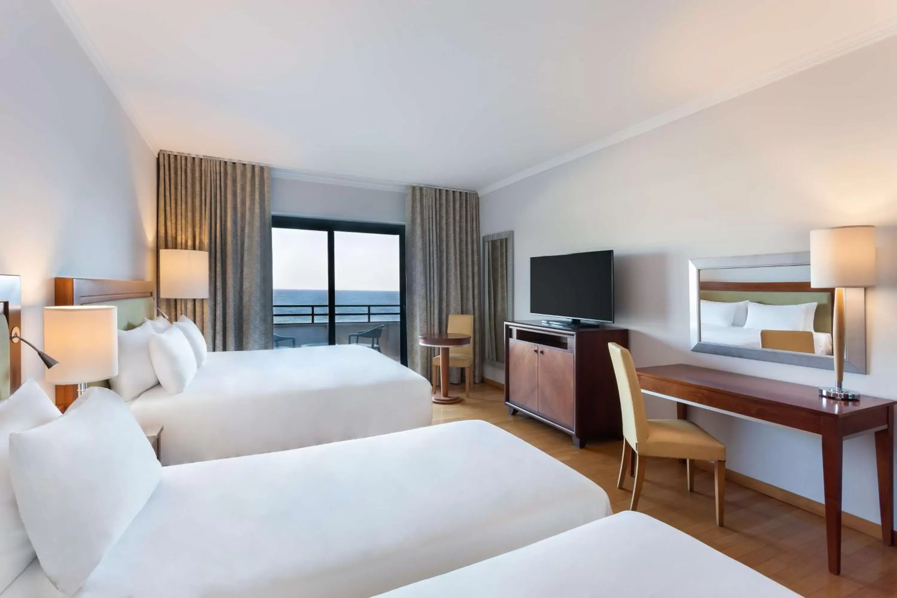 Family Room with Balcony and Sea View in Radisson Blu Resort, Malta St. Julian's Family Room with Balcony and Sea View in Radisson Blu Resort, Malta St. Julian's