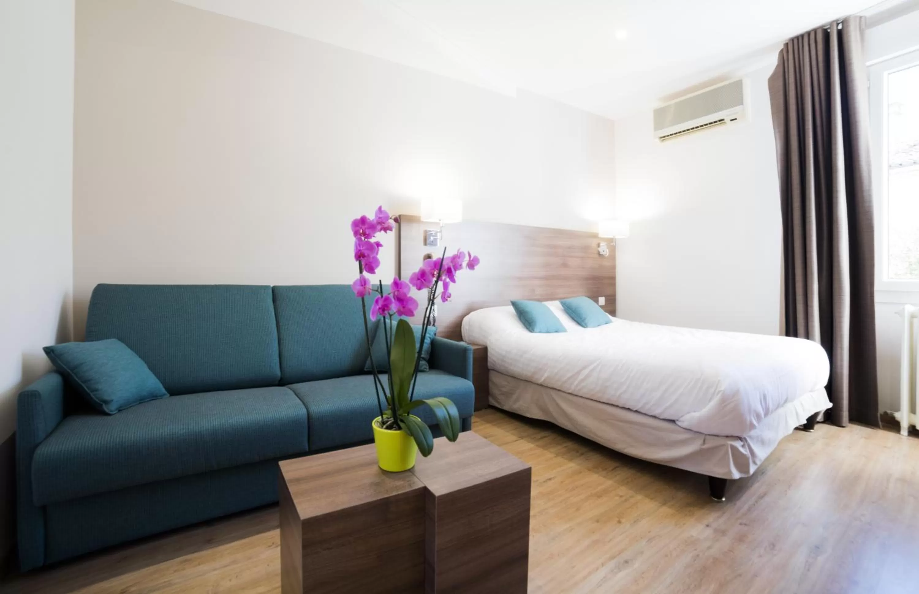 Bedroom, Bed in Logis Hôtel Restaurant Le Cours