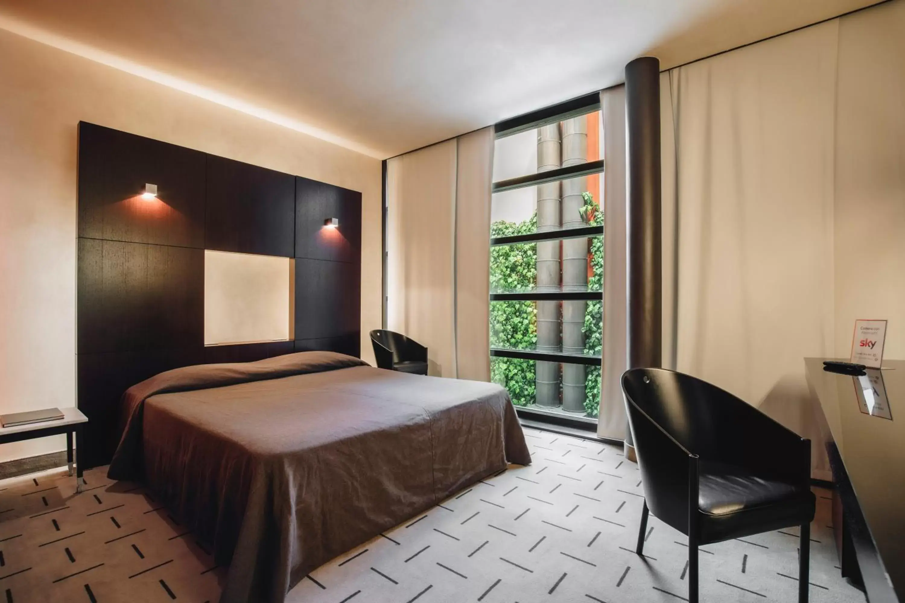 Bedroom in DelleArti Design Hotel