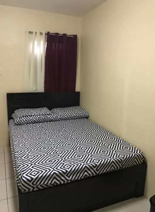 Bed in RV3 TRANSIENT HOUSE