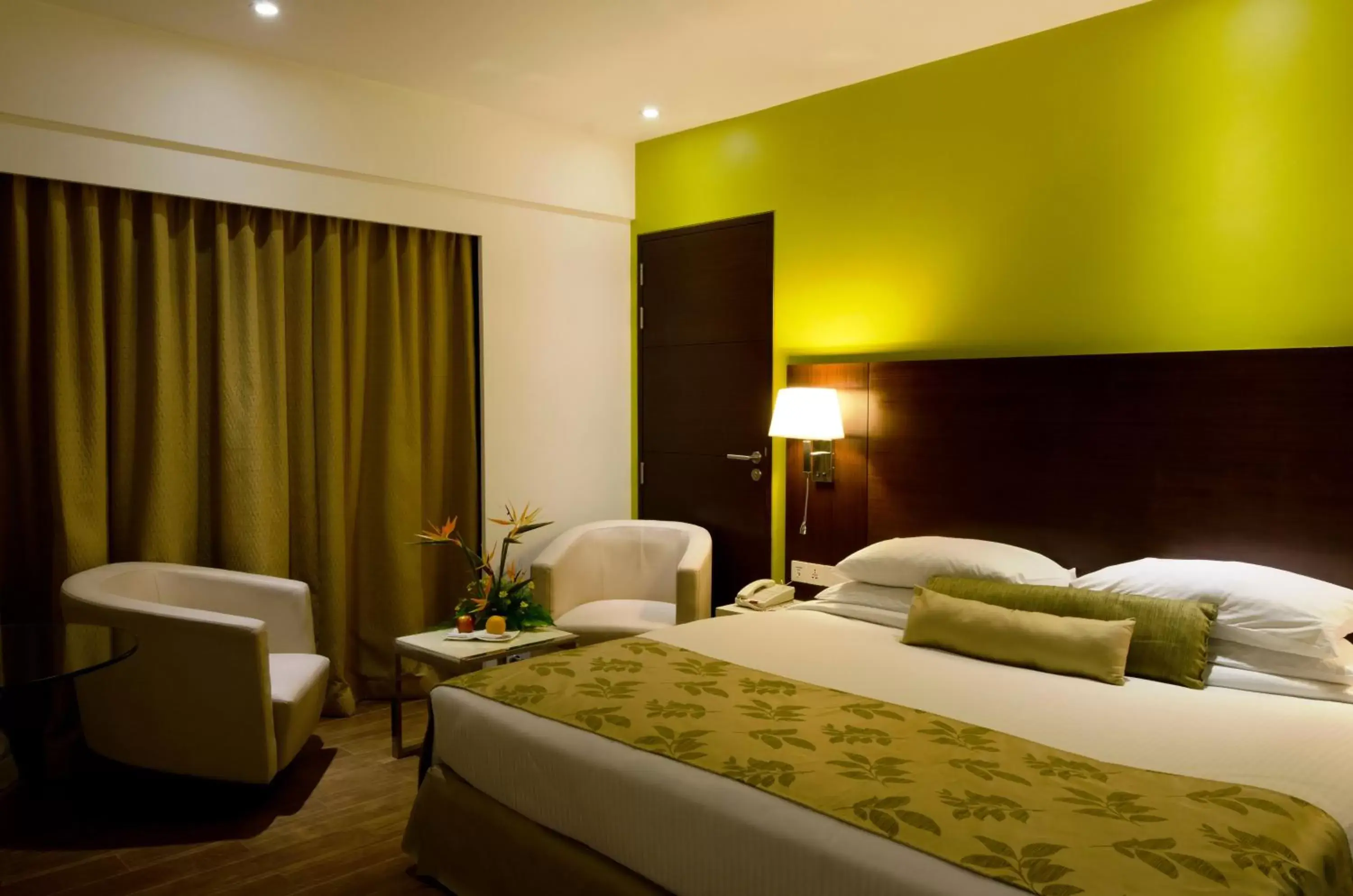 Bedroom, Bed in Ramee Grand Hotel and Spa, Pune