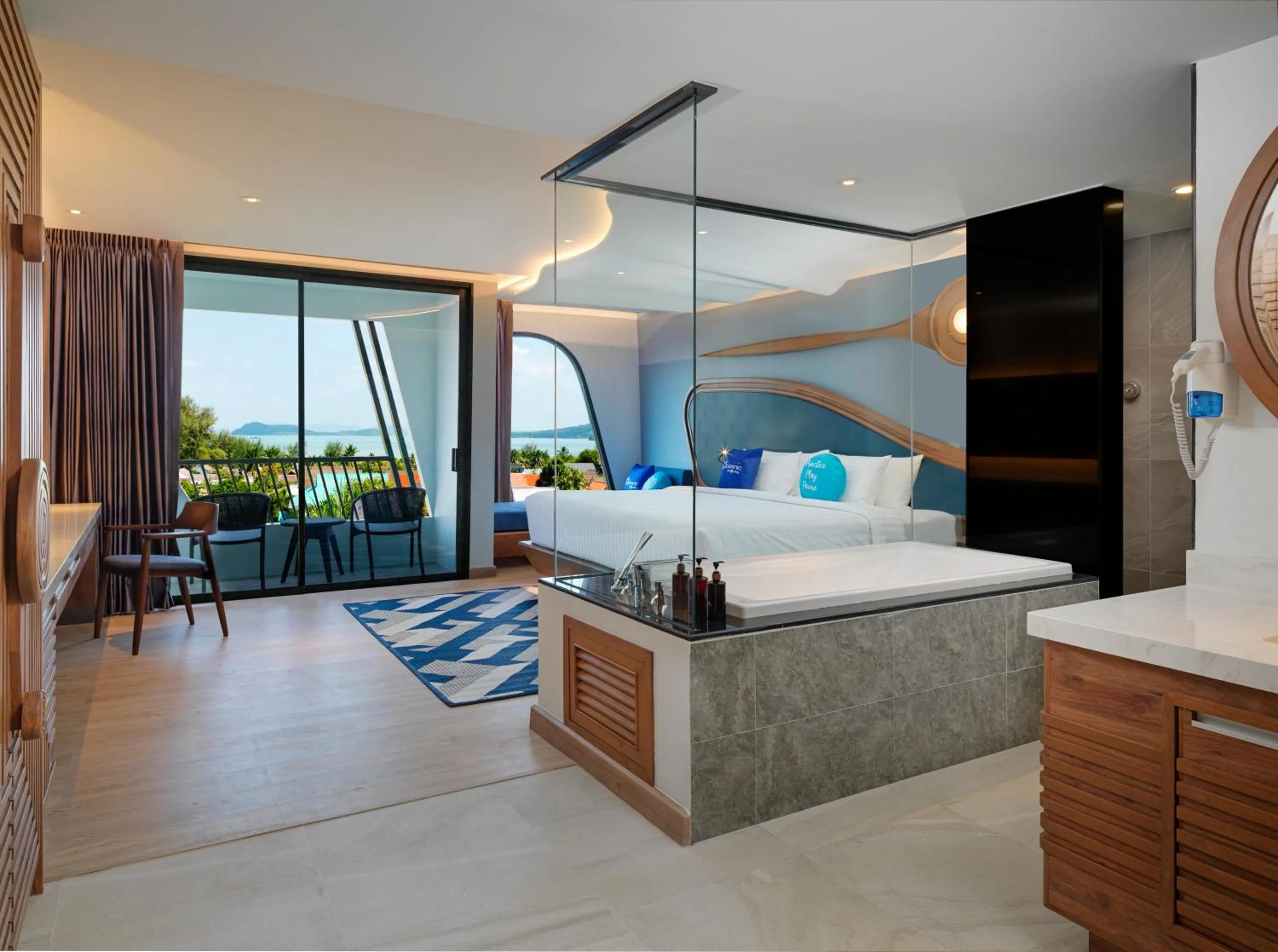 Photo of the whole room, Bed in The Oceanic Sportel Phuket - SHA Extra Plus