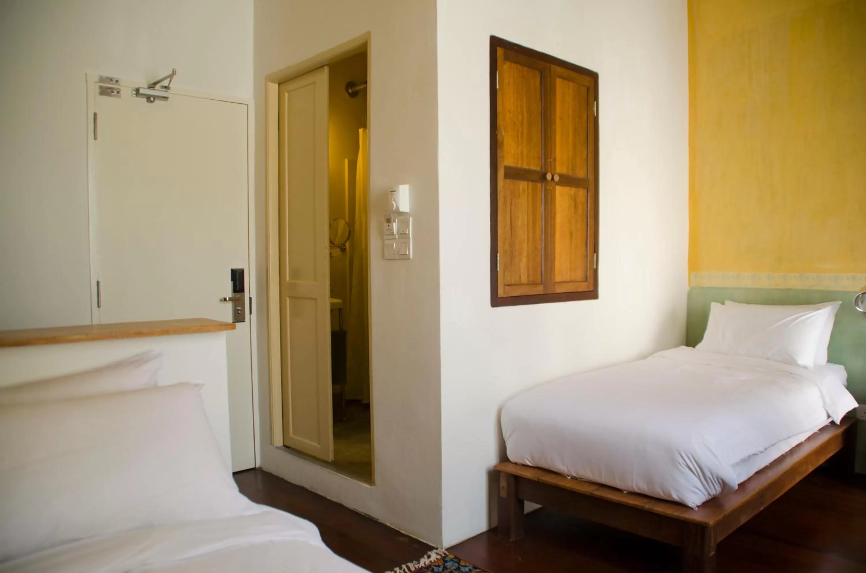 Bed in Ren I Tang Heritage Inn