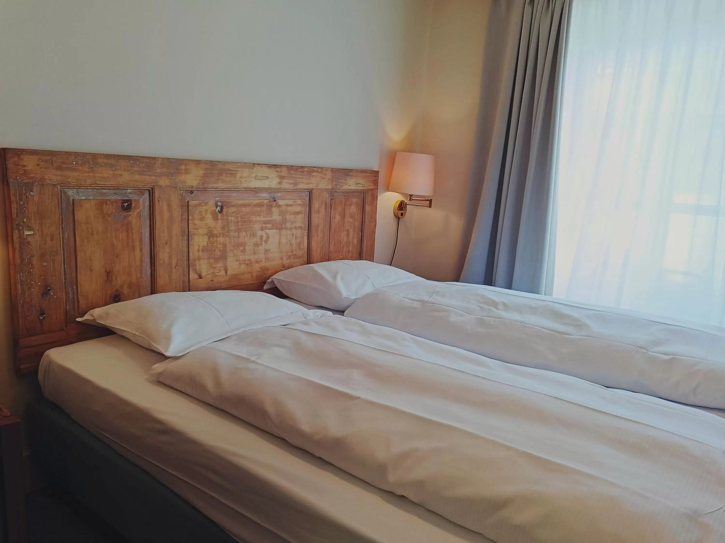 Bed in Hotel Bernina 1865 by Kleos Group Collection