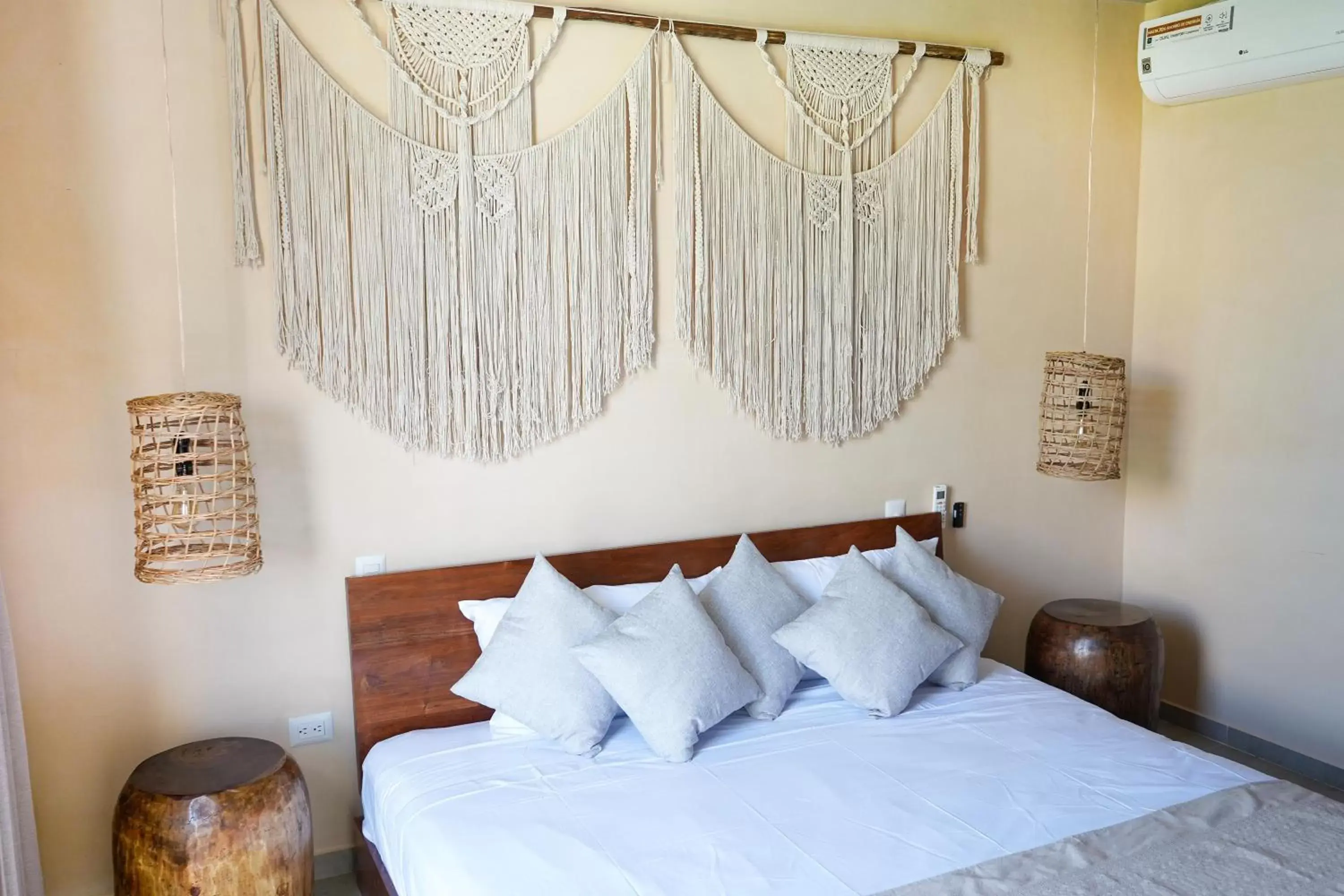 Bed in ARUNA TULUM-Luxury Studios & Apartments