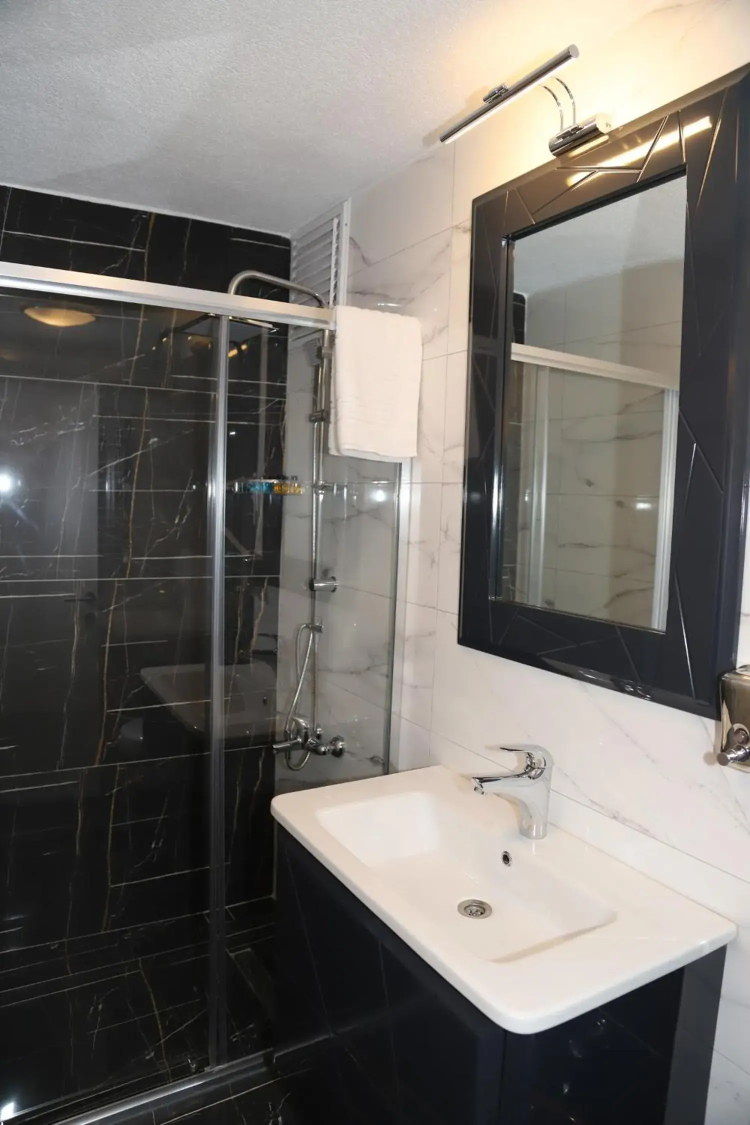 Bathroom in Grand Kavi Hotel