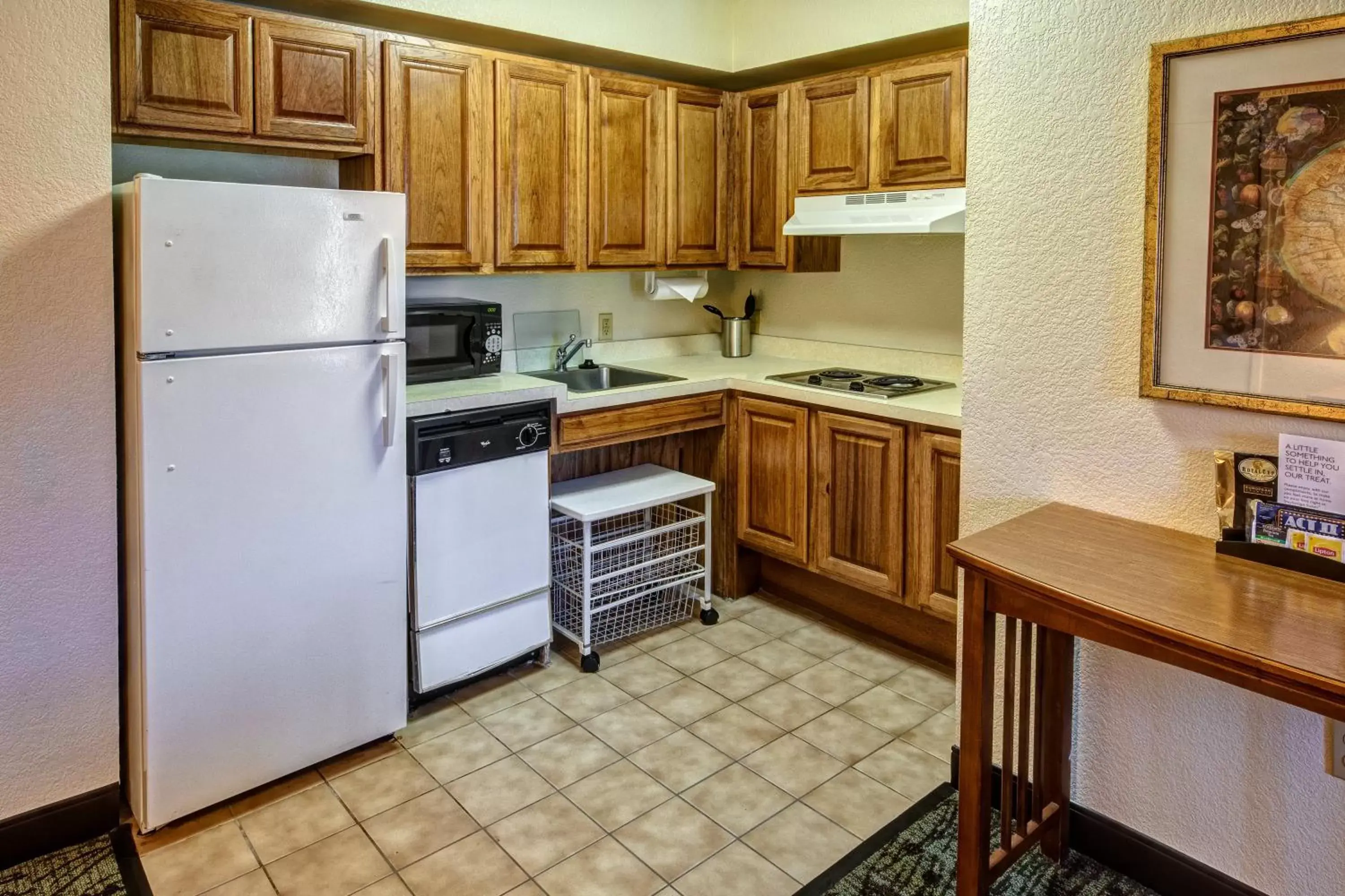 Bedroom, Kitchen/Kitchenette in Staybridge Suites Denver - Cherry Creek, an IHG Hotel