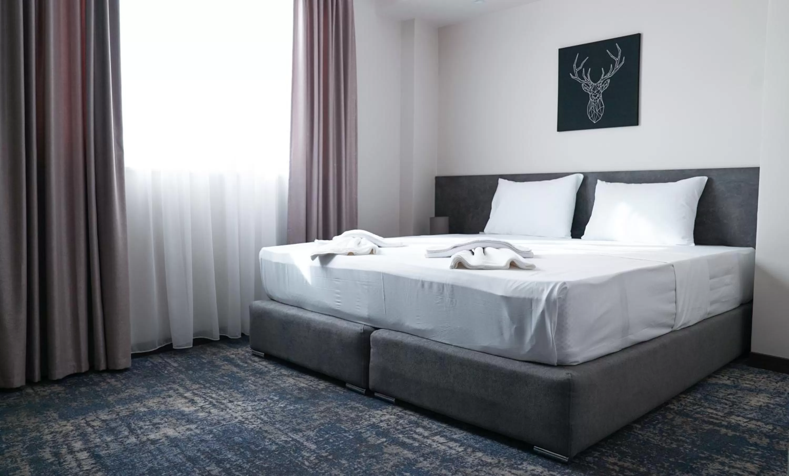 Bed in Hotel Premium