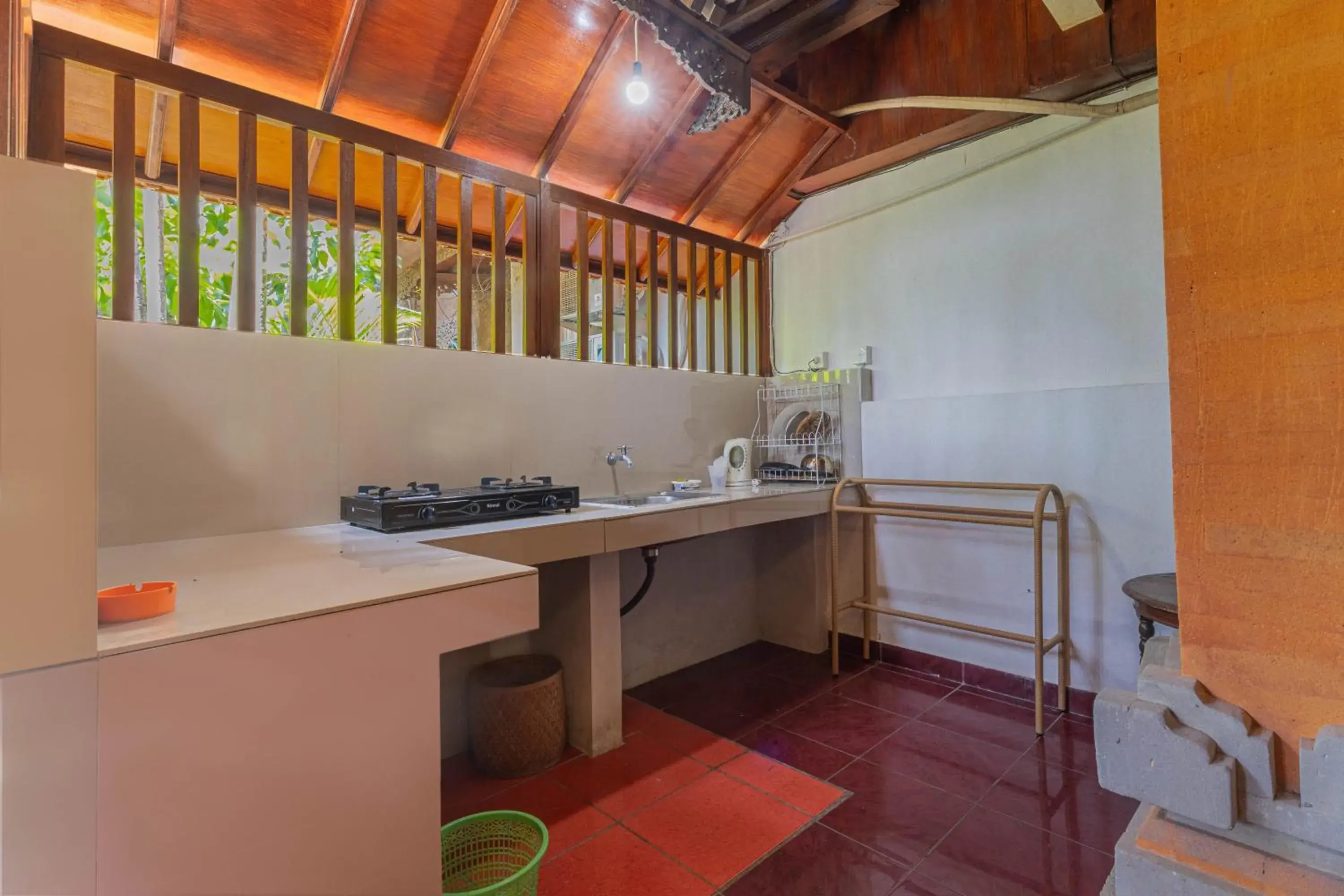 kitchen, Bathroom in OYO 3868 Puri Mango Hotel