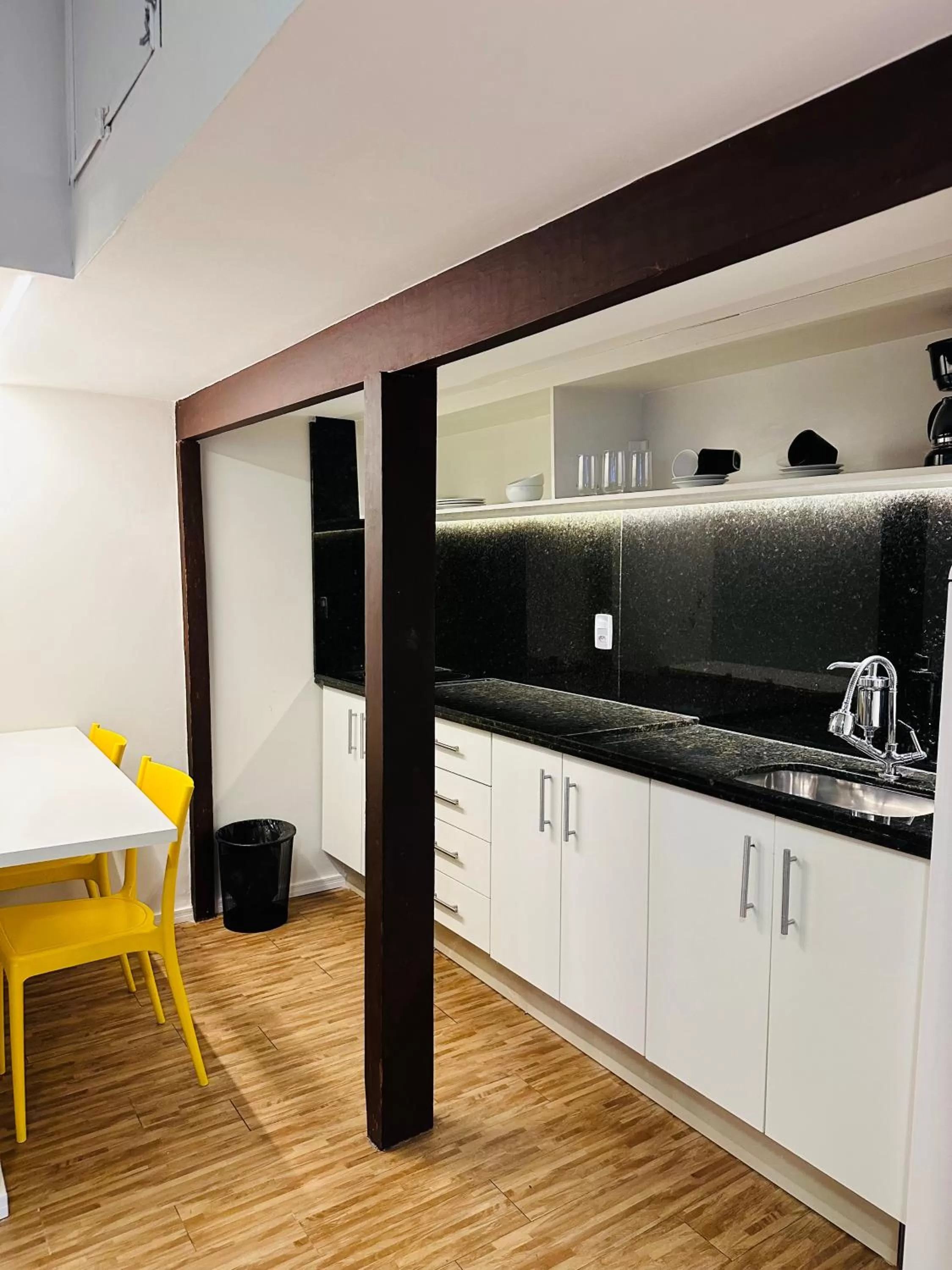 Kitchen or kitchenette in Injoy Suítes & Aparts