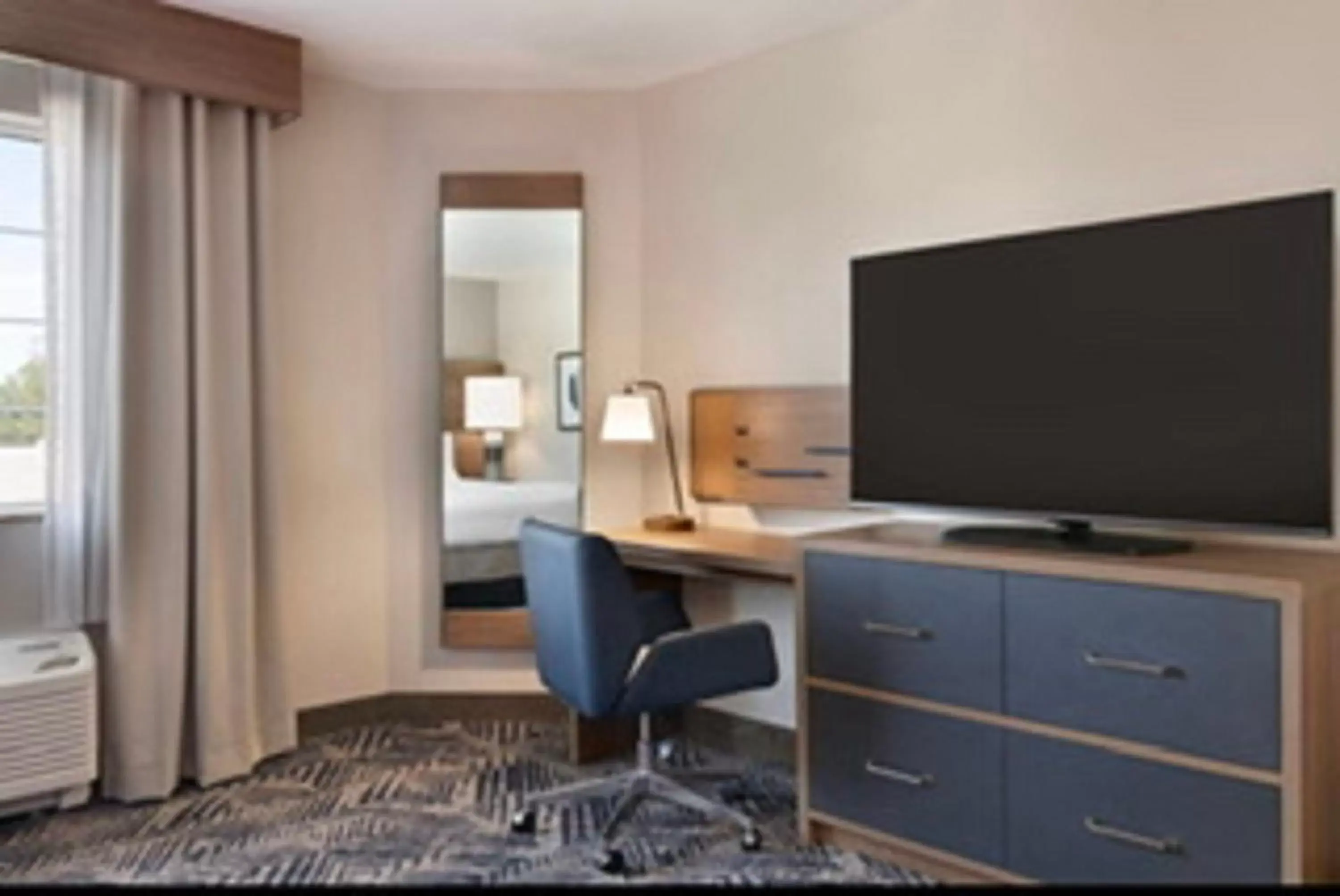 Photo of the whole room, TV/Entertainment Center in Candlewood Suites Mount Pleasant, an IHG Hotel