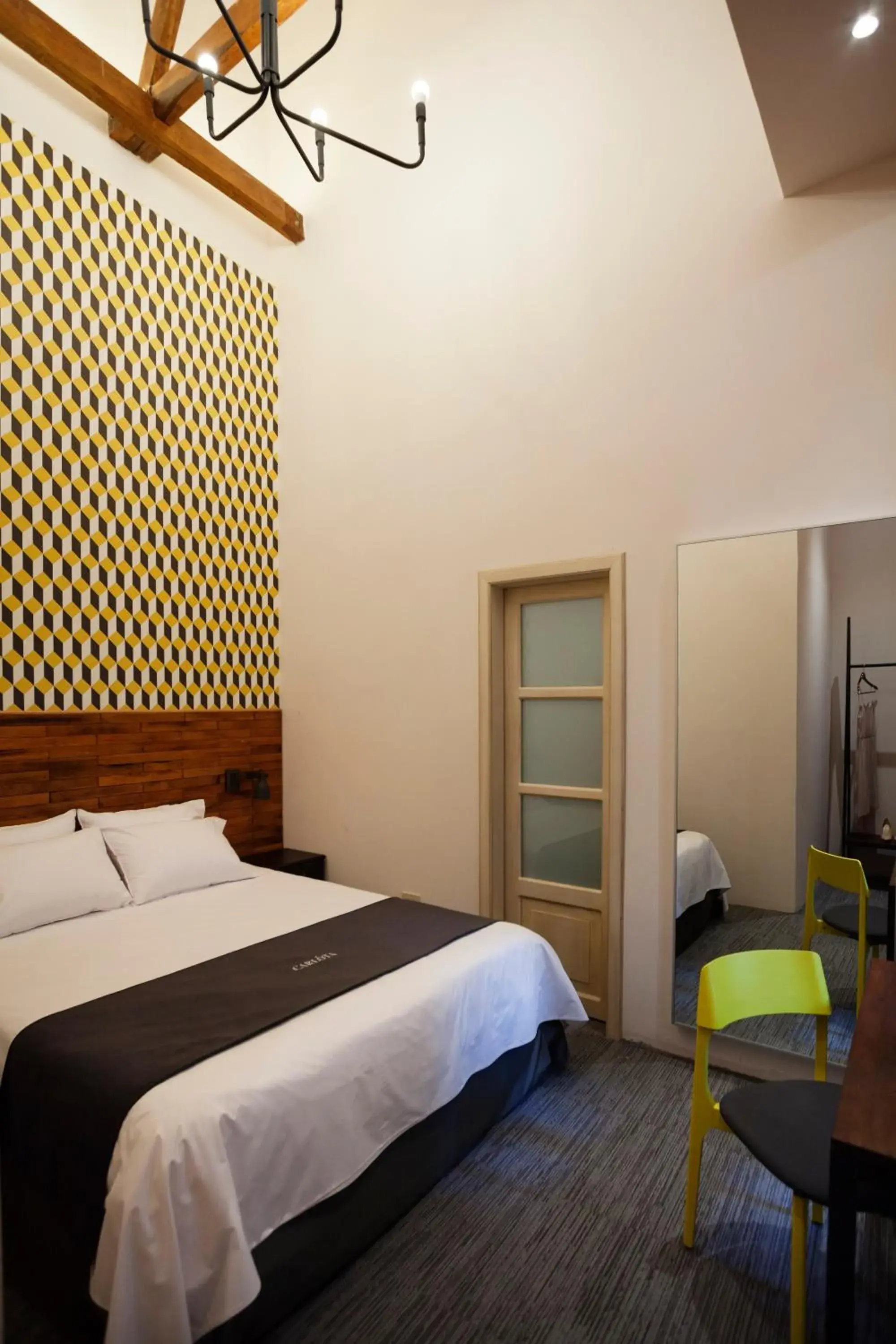 Photo of the whole room, Bed in Carlota Sustainable Design Hotel
