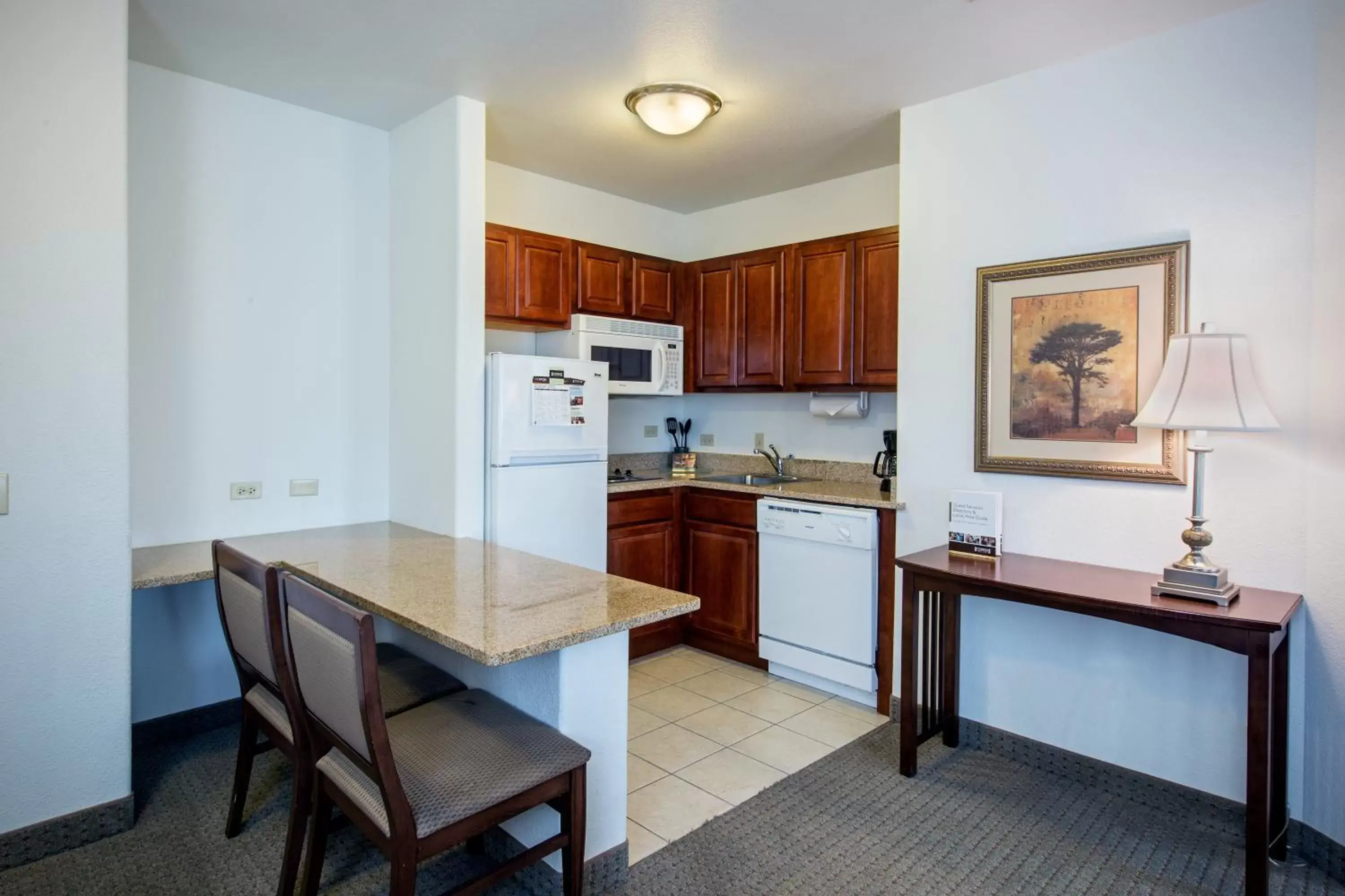 Photo of the whole room, Kitchen/Kitchenette in Staybridge Suites Rockford, an IHG Hotel