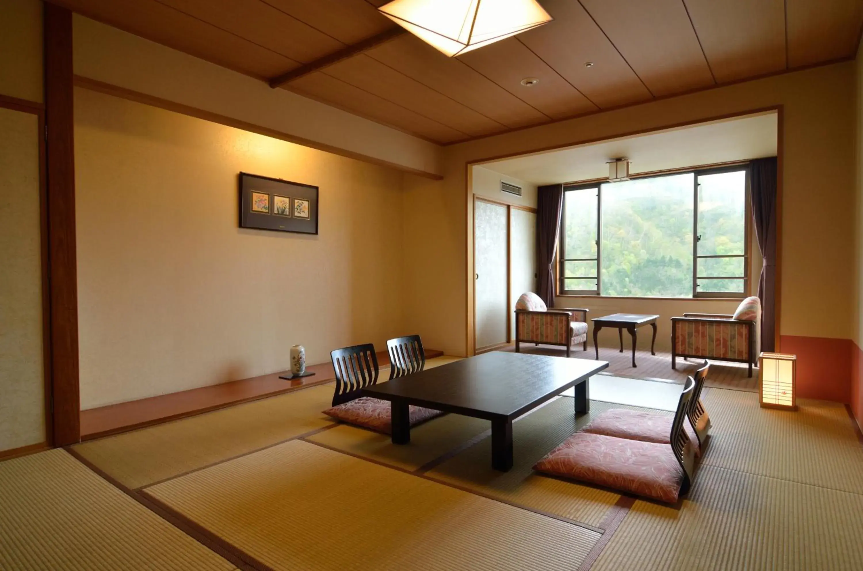 Photo of the whole room, Seating Area in Jozankei Manseikaku Hotel Milione