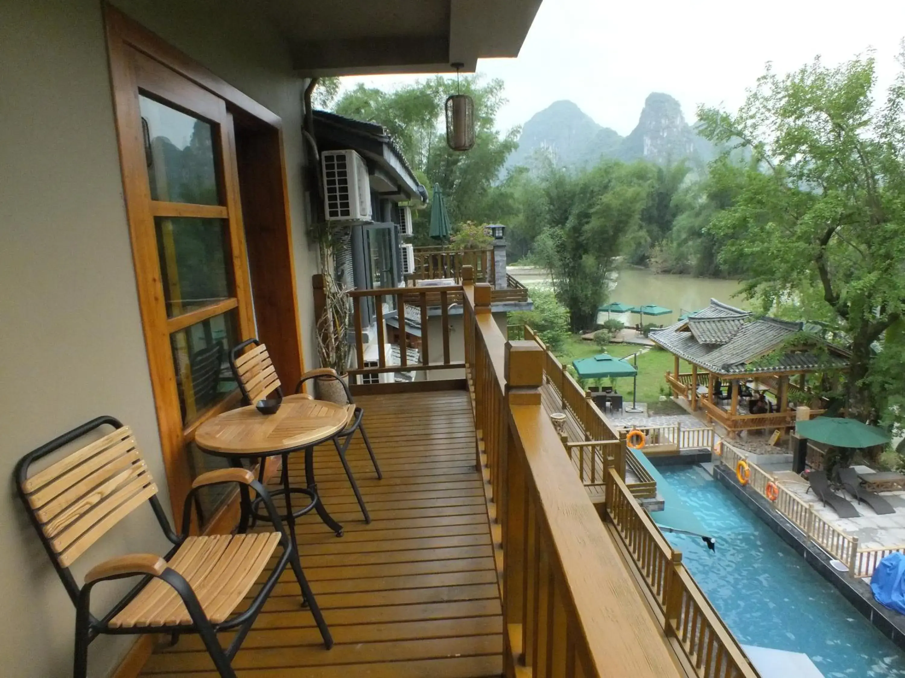 Balcony/Terrace, Pool View in Yangshuo Moondance Hotel