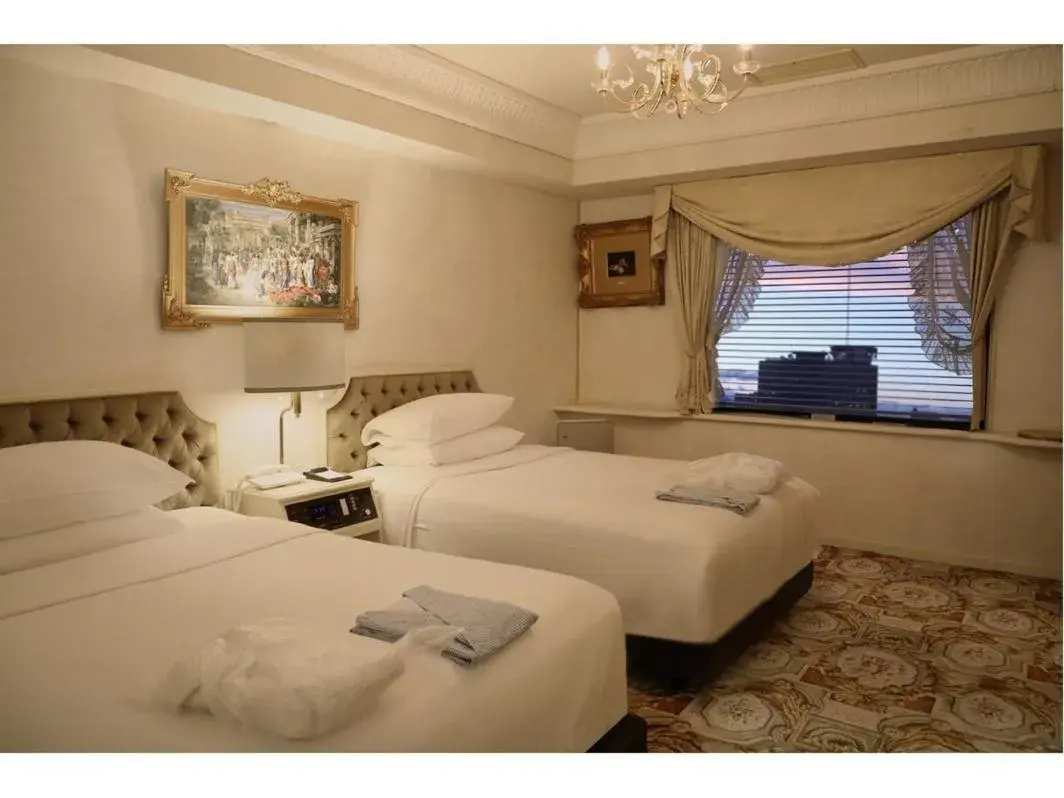 Bed in Koyo Grand Hotel