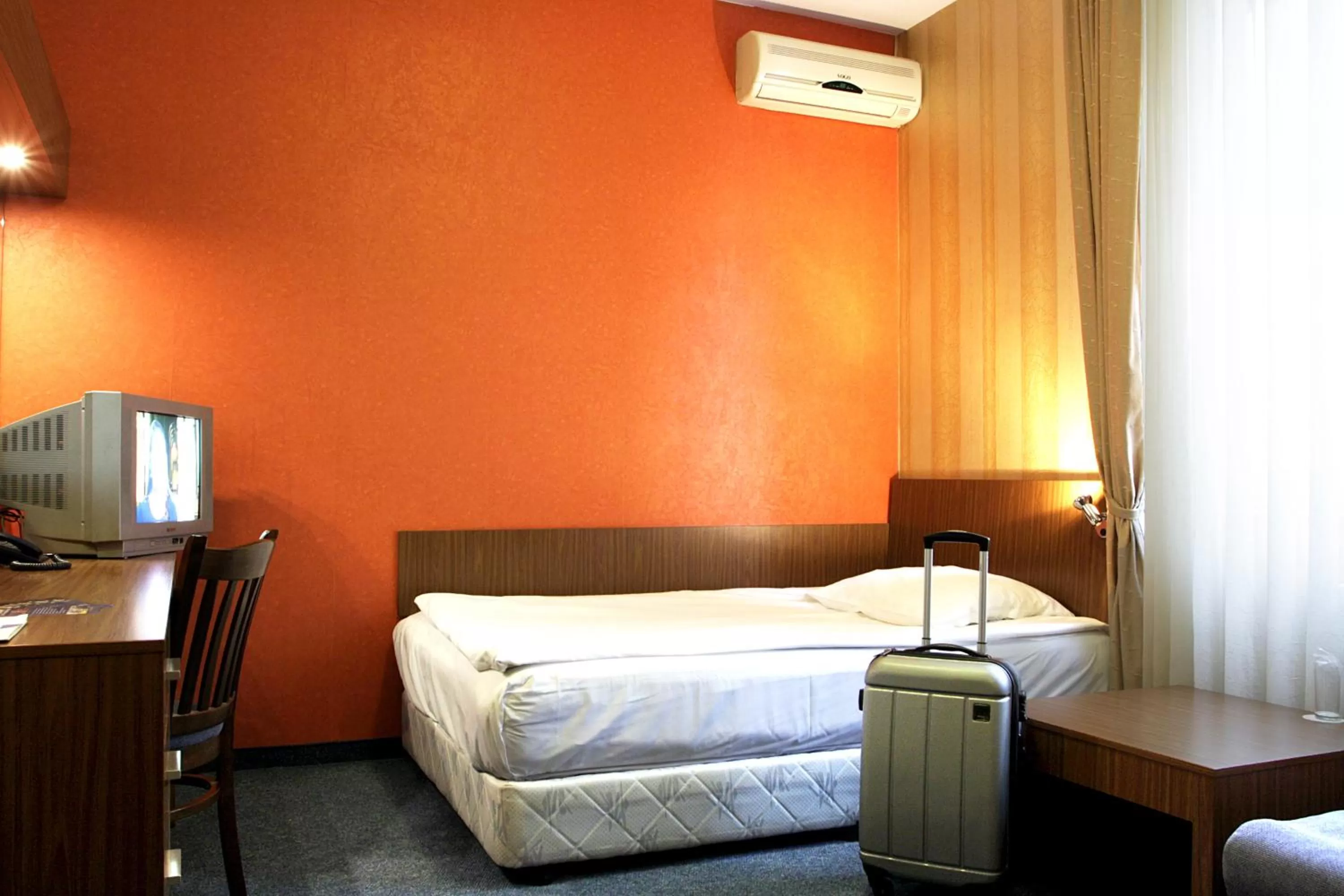 Bed in DITER Family Hotel