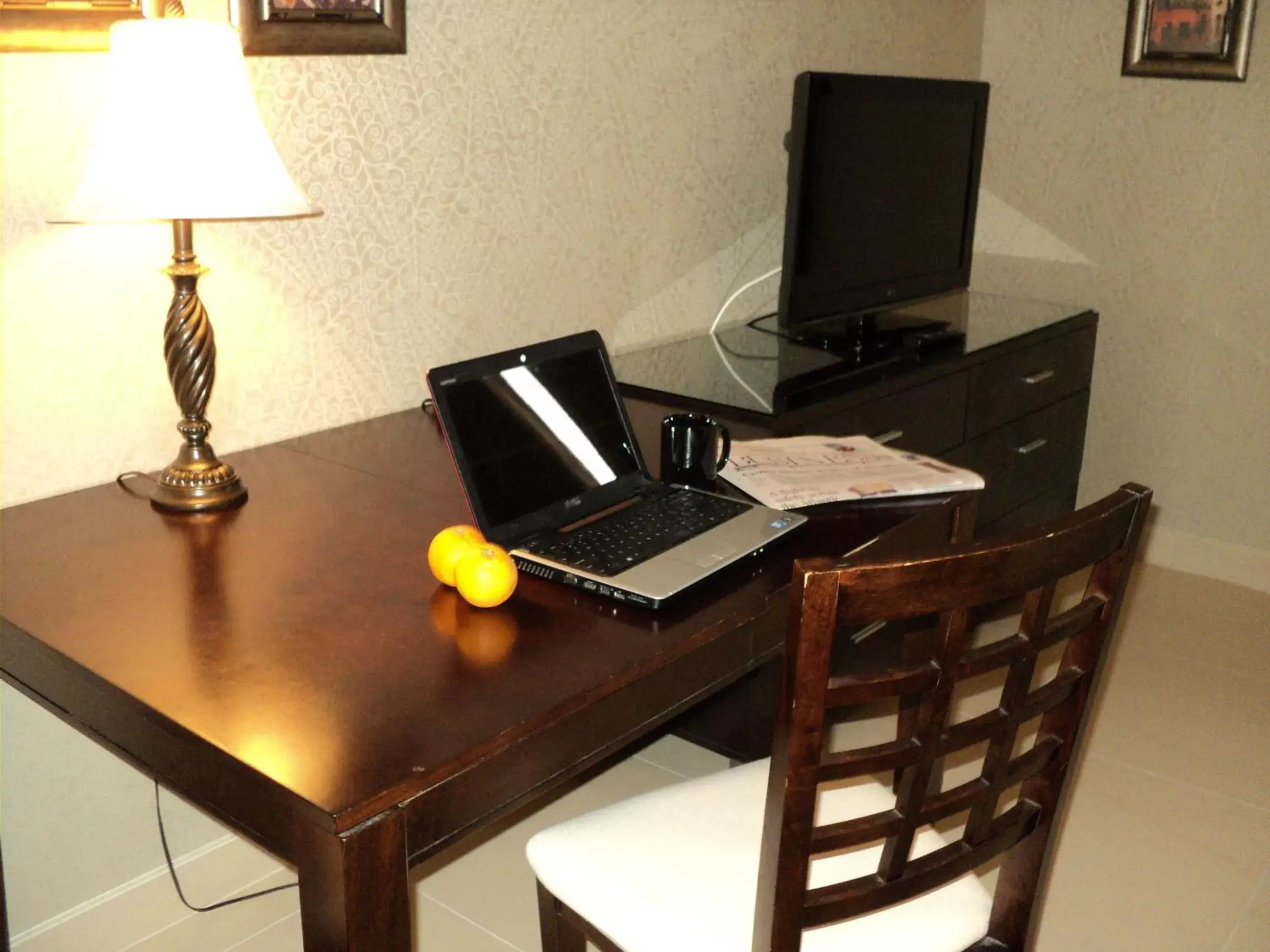 Seating area, TV/Entertainment Center in Montecassino Hotel & Suites