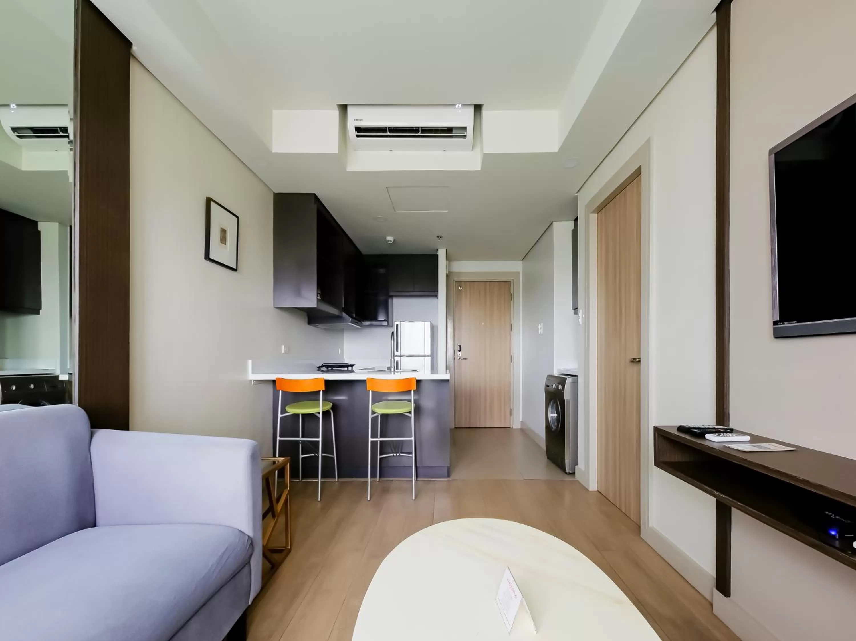 Living room, Seating Area in Capital O 804 The Residences at Bonifacio Civic Center