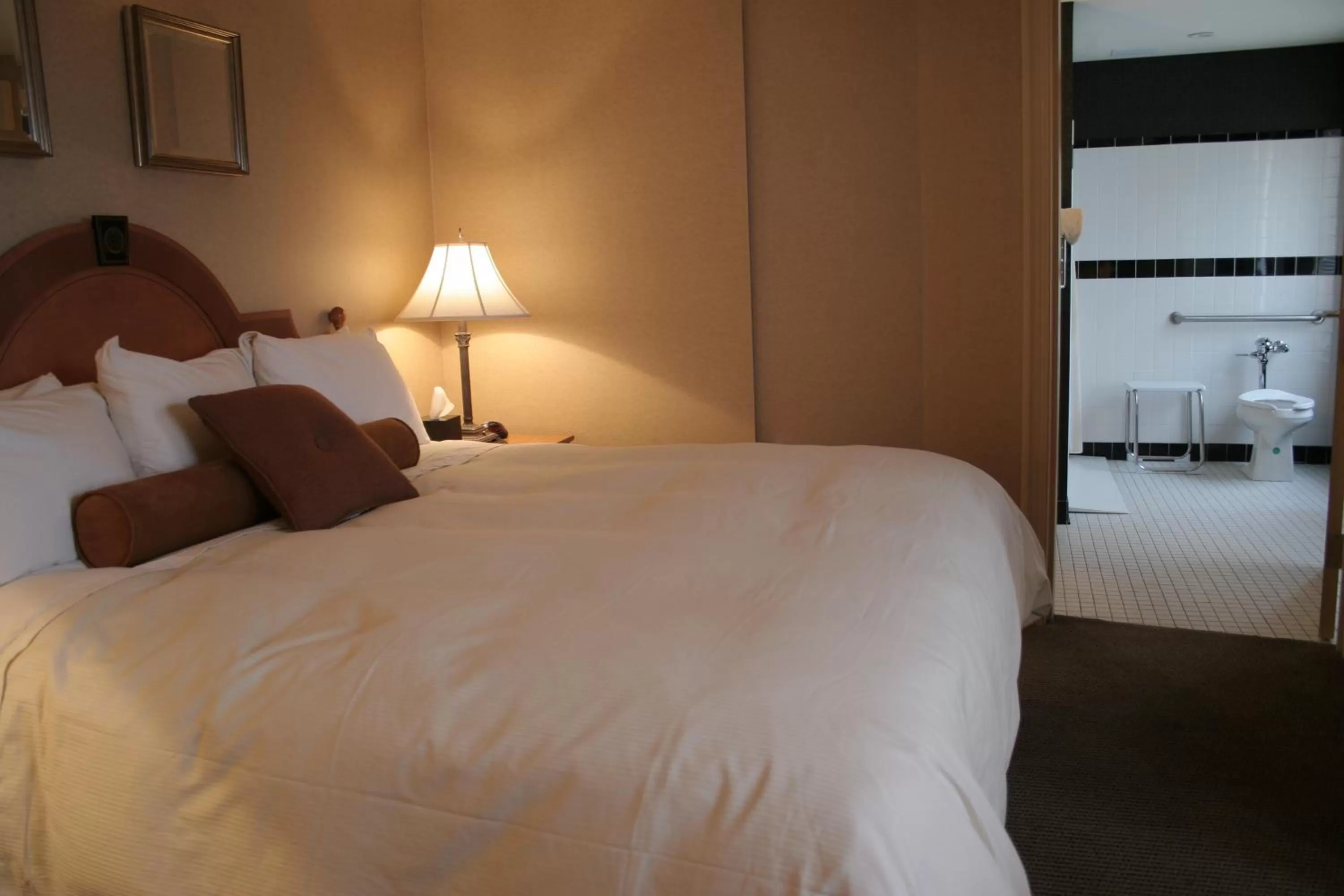 Bed in Ambassador Hotel Milwaukee, Trademark Collection by Wyndham