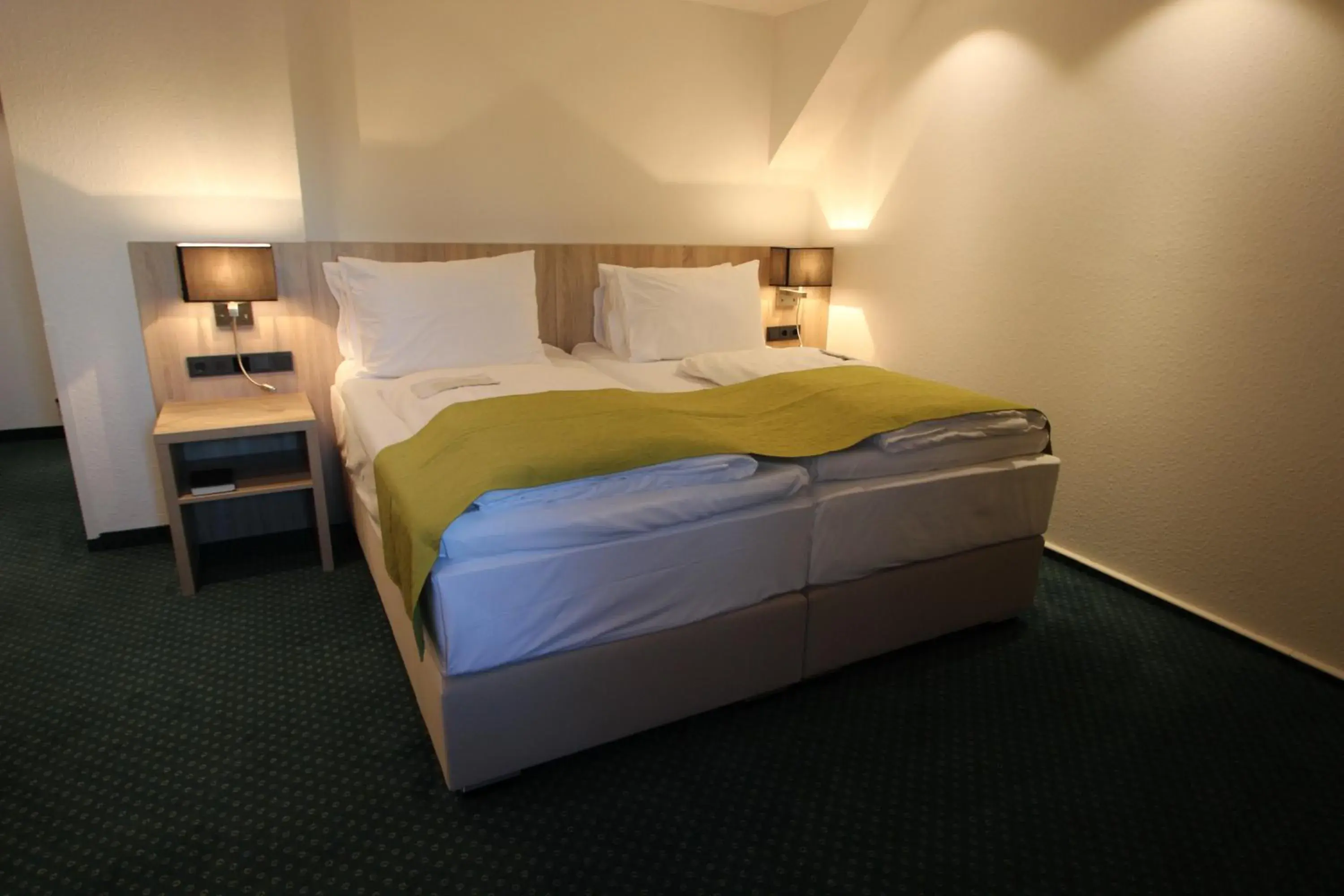 Bed in Hotel Allegro