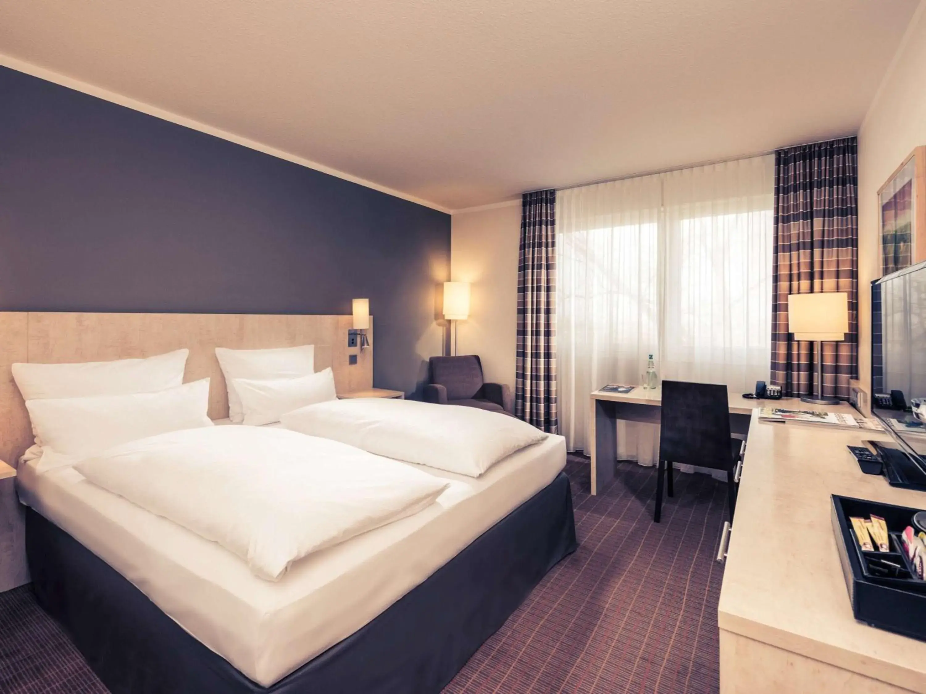 Photo of the whole room, Bed in Mercure Hotel Bielefeld Johannisberg