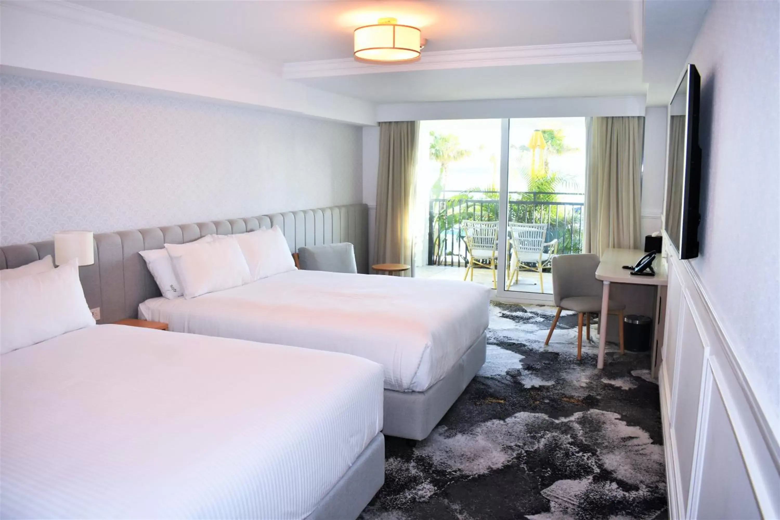 Bed in The Beachcomber Hotel & Resort, Ascend Hotel Collection